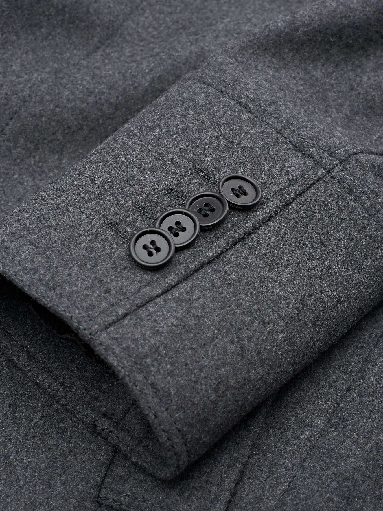 Cunning Coat in Black/grey melange from Tiger of Sweden Cunning Coat in Black/grey melange from Tiger of Sweden