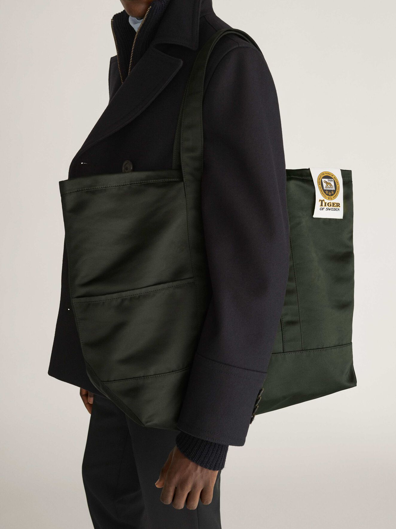 Drop S Tote in Dark green from Tiger of Sweden Drop S Tote in Dark green from Tiger of Sweden