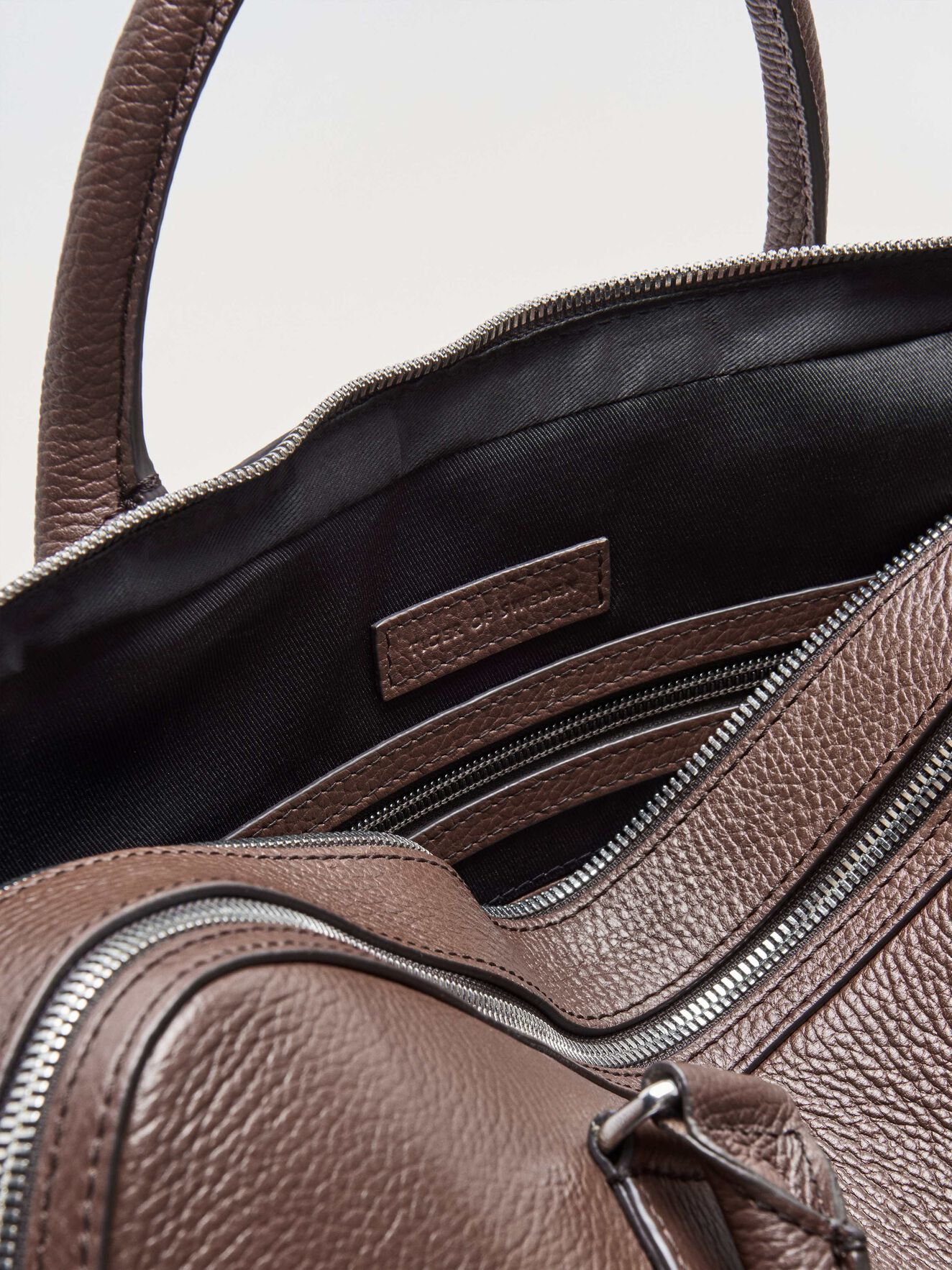 Burin Briefcase in Cognac from Tiger of Sweden Burin Briefcase in Cognac from Tiger of Sweden