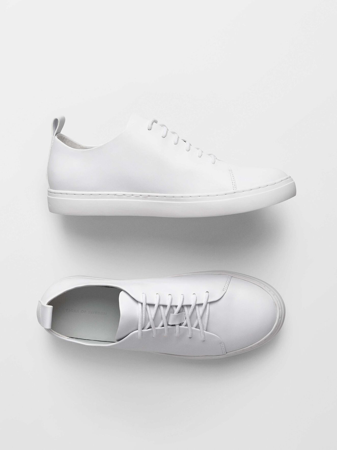 white leather lace up trainers