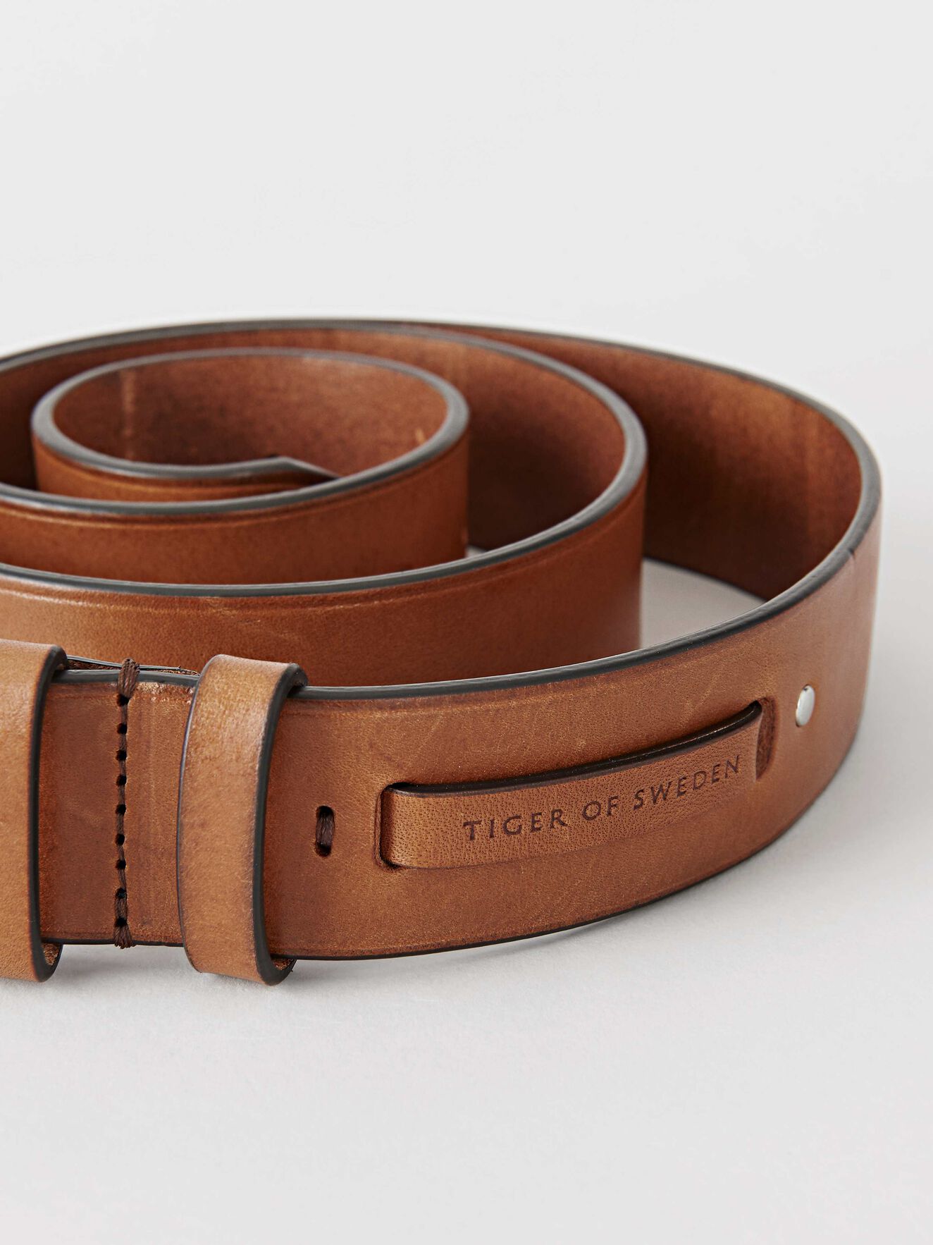 Bombazine Gürtel in Cognac from Tiger of Sweden Bombazine Gürtel in Cognac from Tiger of Sweden