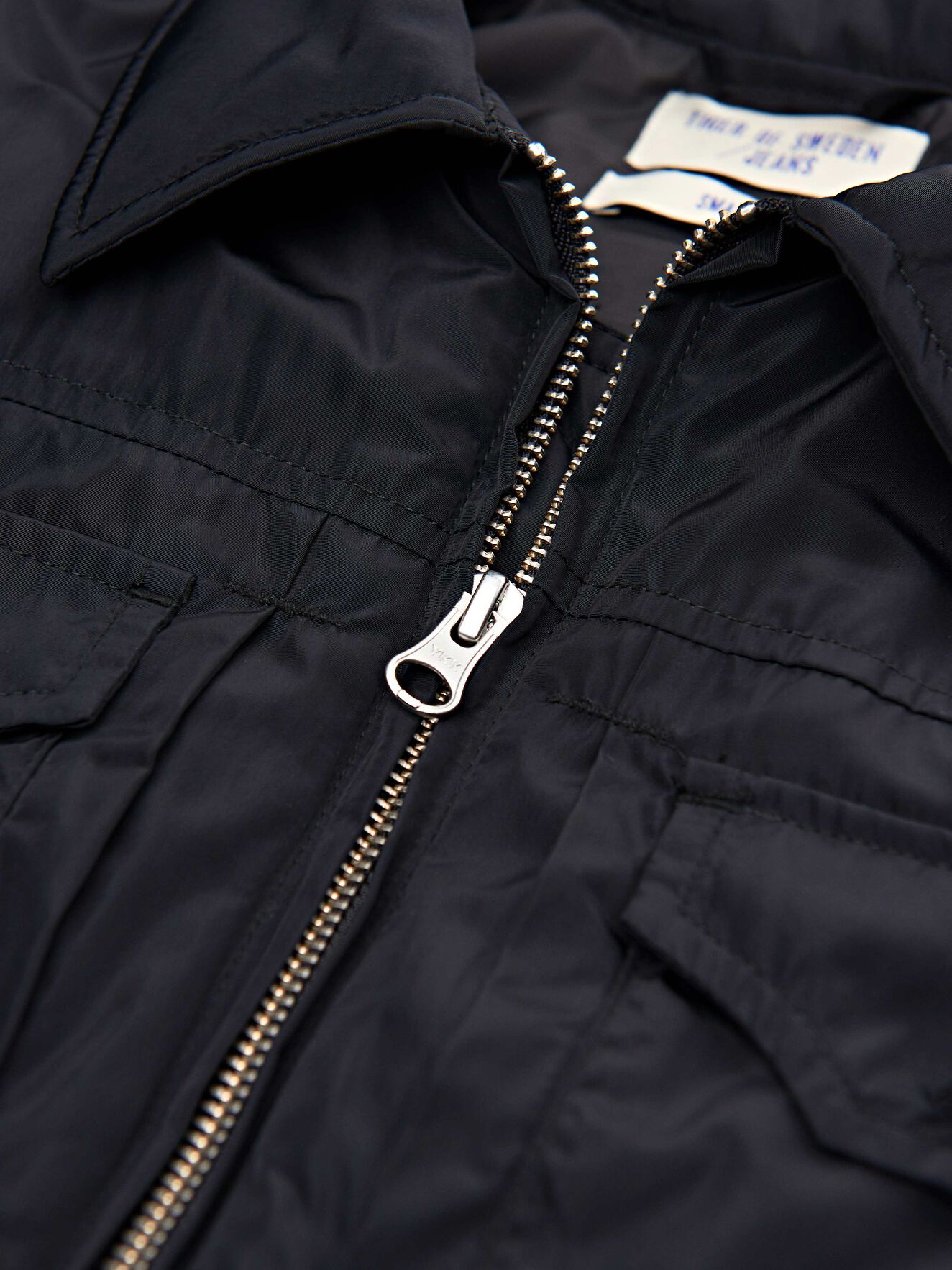 Blouson en nylon Sus in Black from Tiger of Sweden Blouson en nylon Sus in Black from Tiger of Sweden
