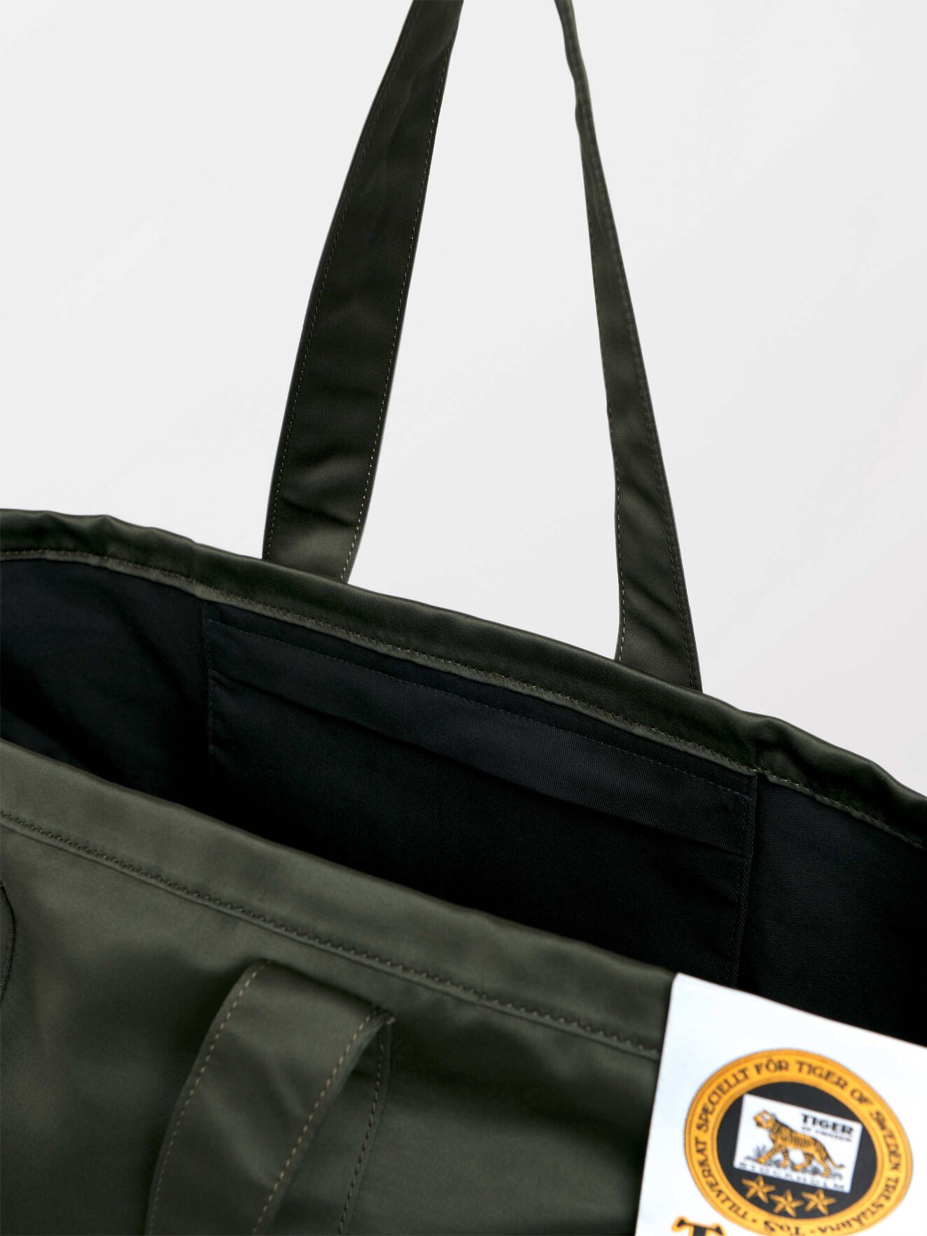 Drop S Tote in Dark green from Tiger of Sweden Drop S Tote in Dark green from Tiger of Sweden