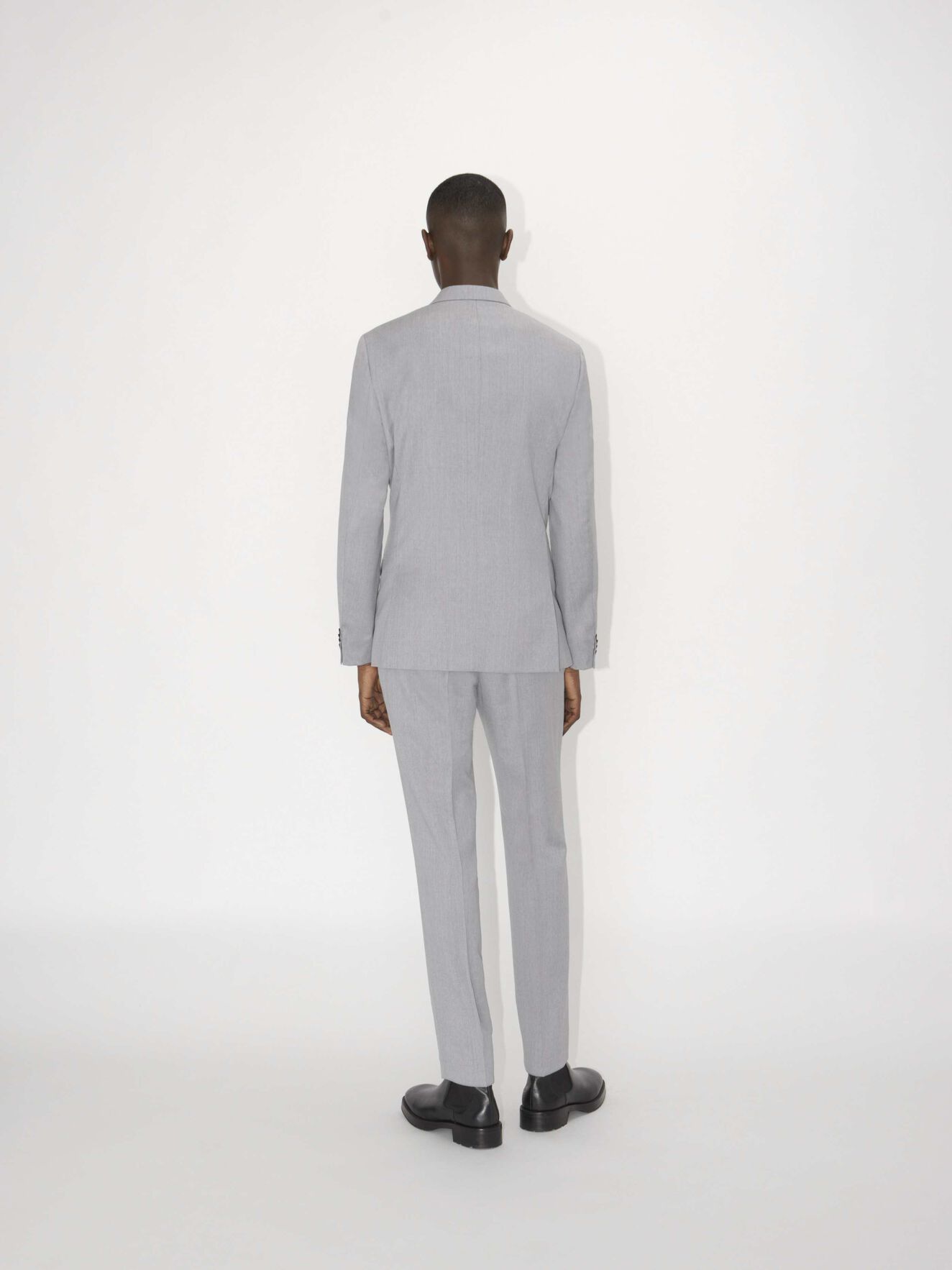 Thodd Trousers in Light grey melange from Tiger of Sweden Thodd Trousers in Light grey melange from Tiger of Sweden
