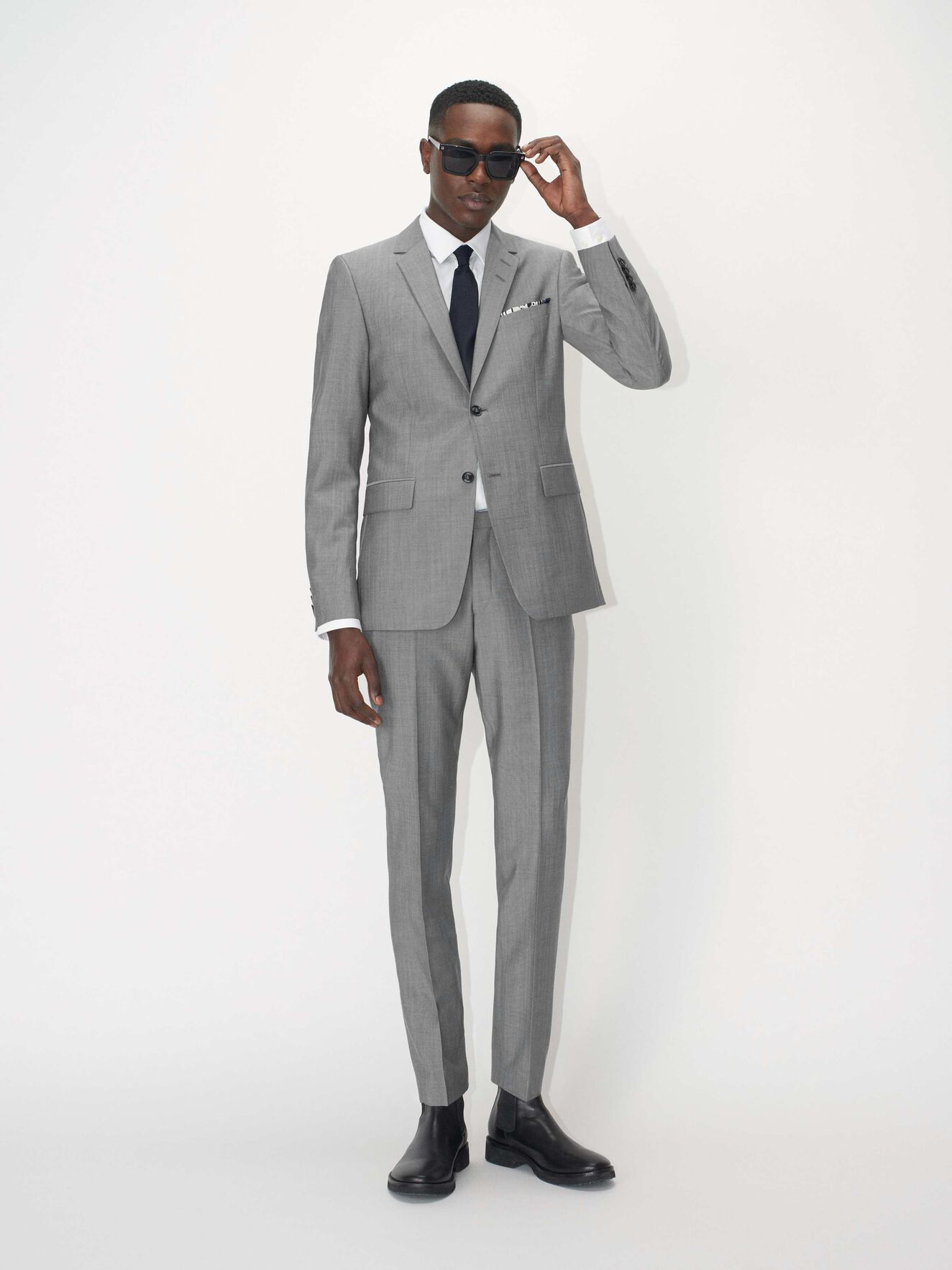 Todd Trousers in Light grey melange from Tiger of Sweden Todd Trousers in Light grey melange from Tiger of Sweden