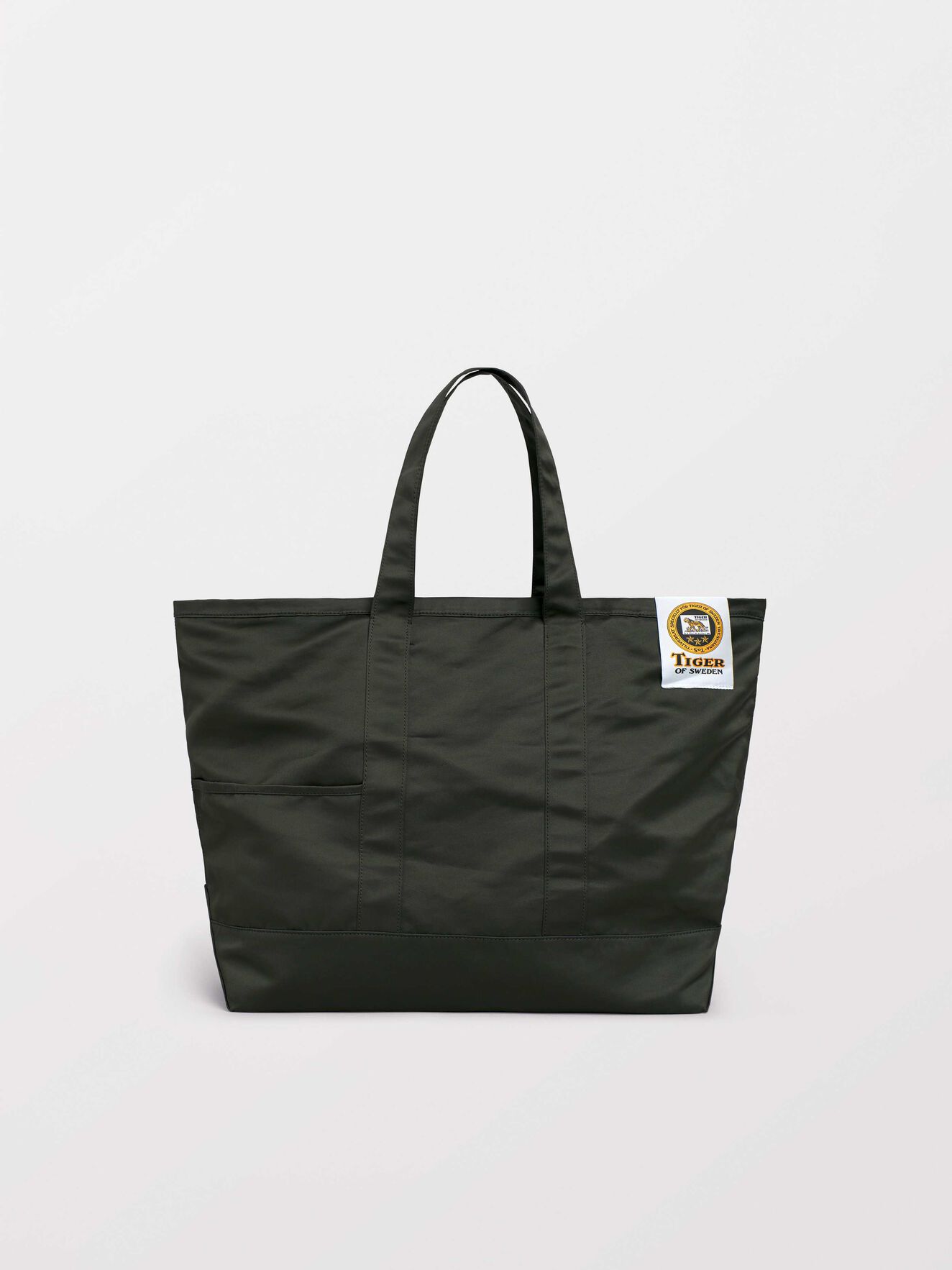 Drop S Tote in Dark green from Tiger of Sweden Drop S Tote in Dark green from Tiger of Sweden