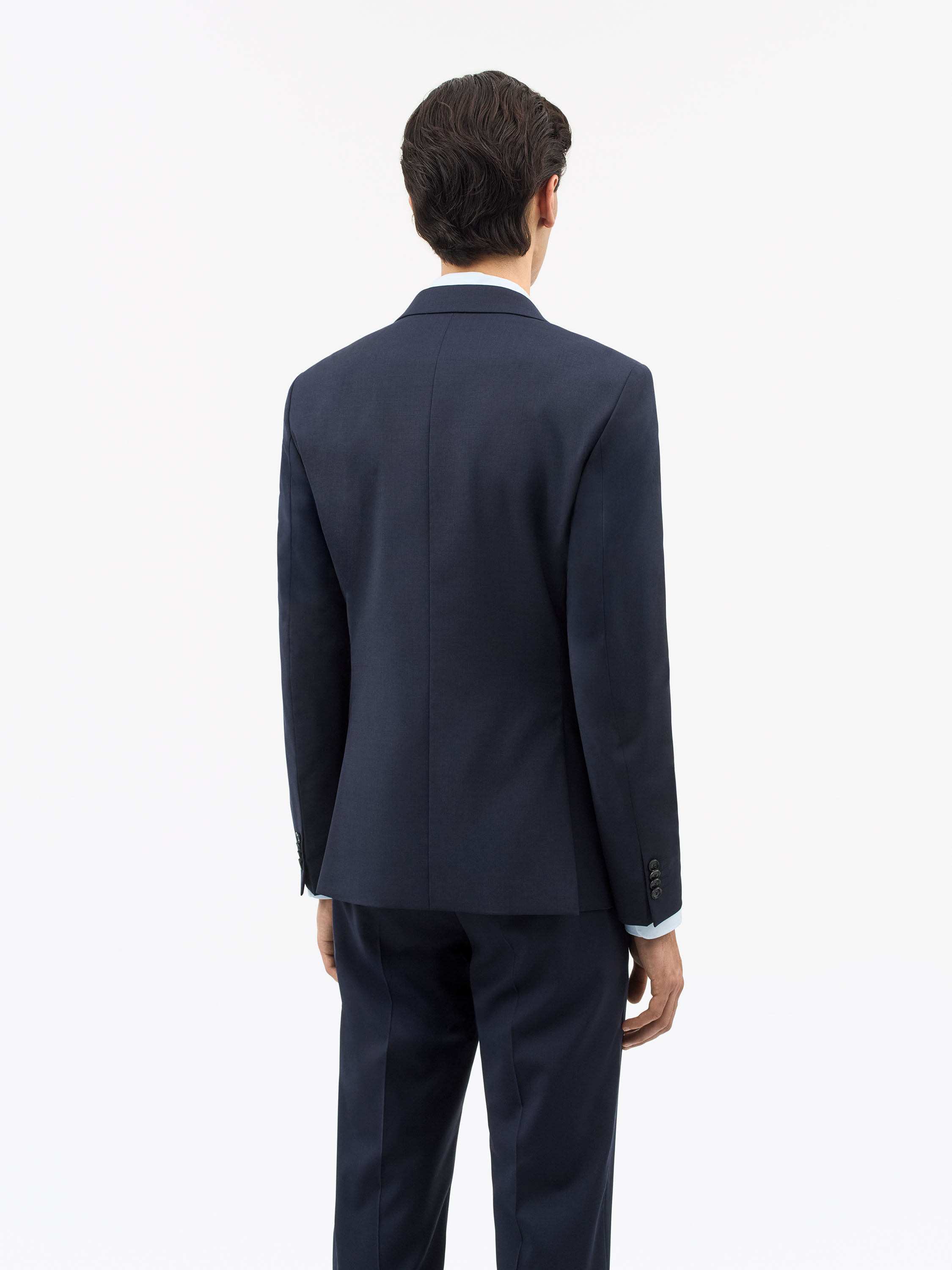 man in navy blue suit