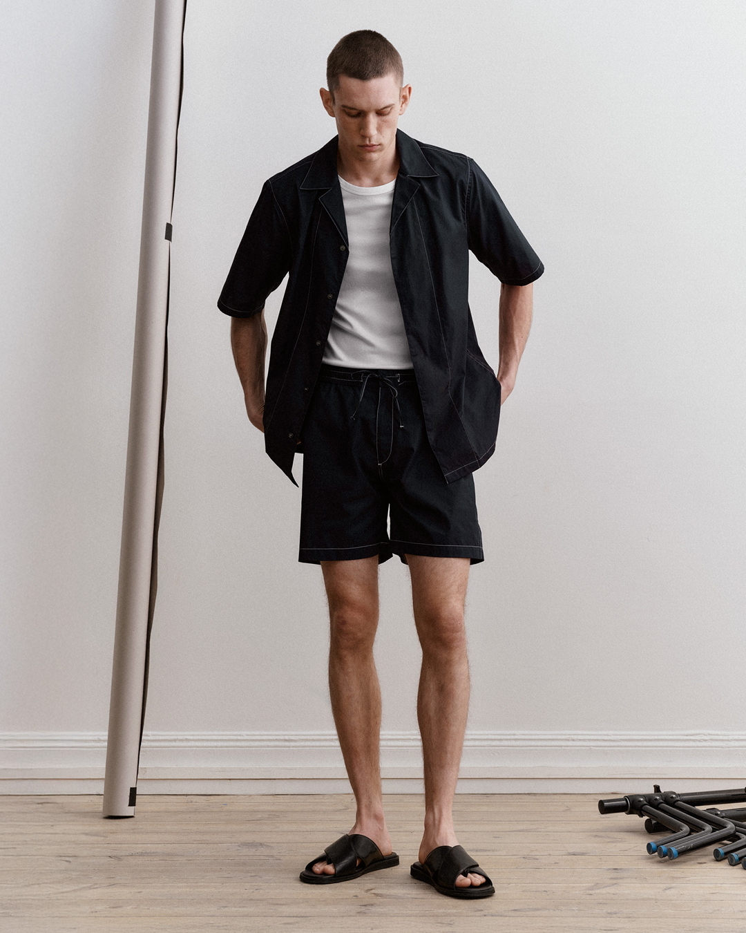 man in dark blue short set