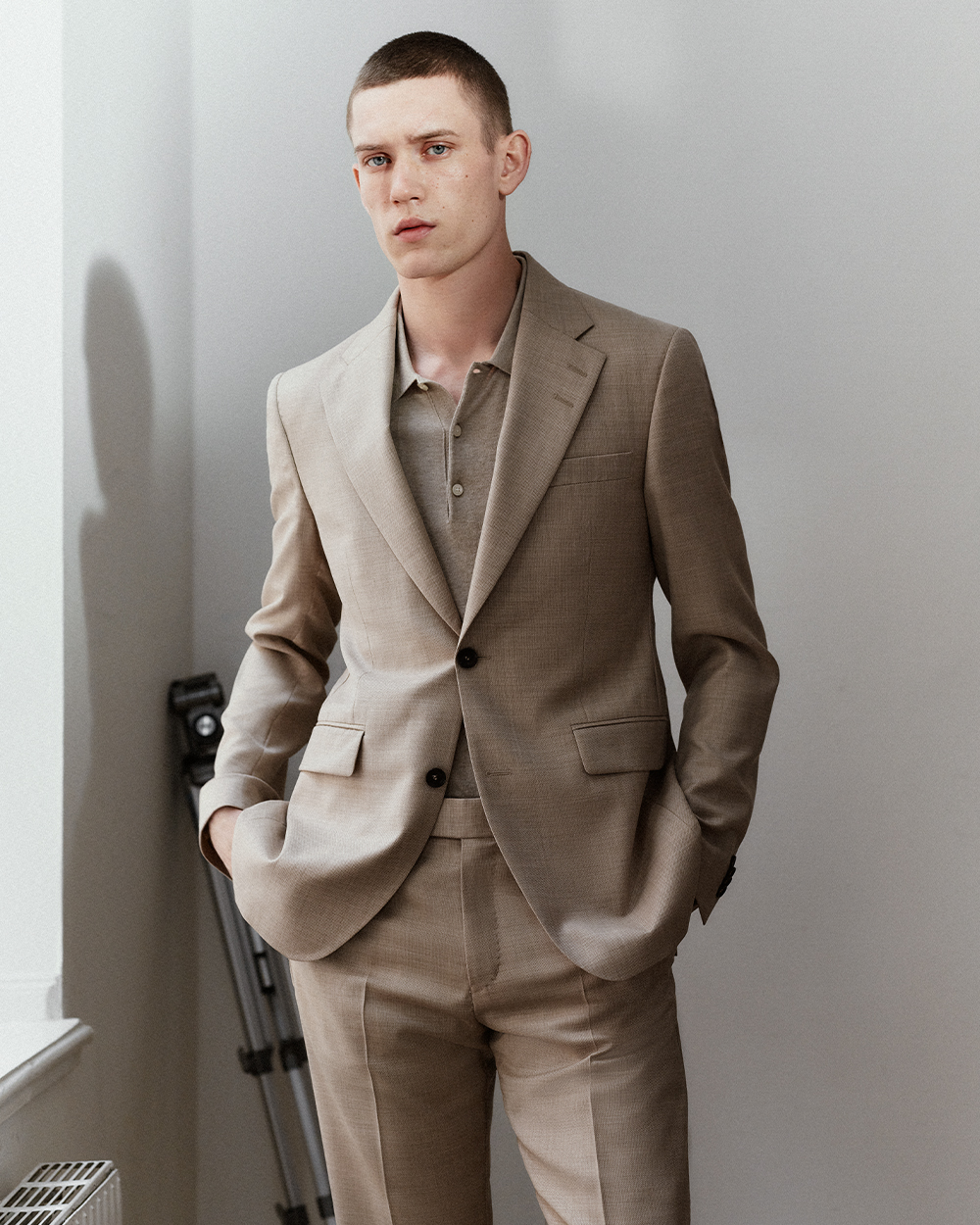 Man in light beige suit