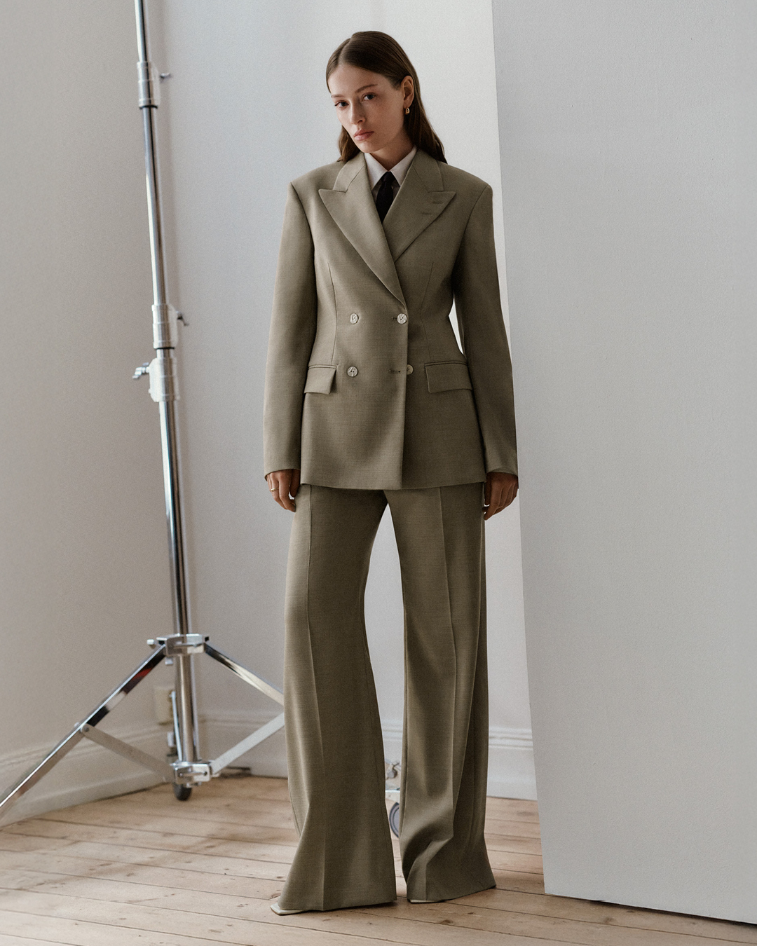 woman in beige suit