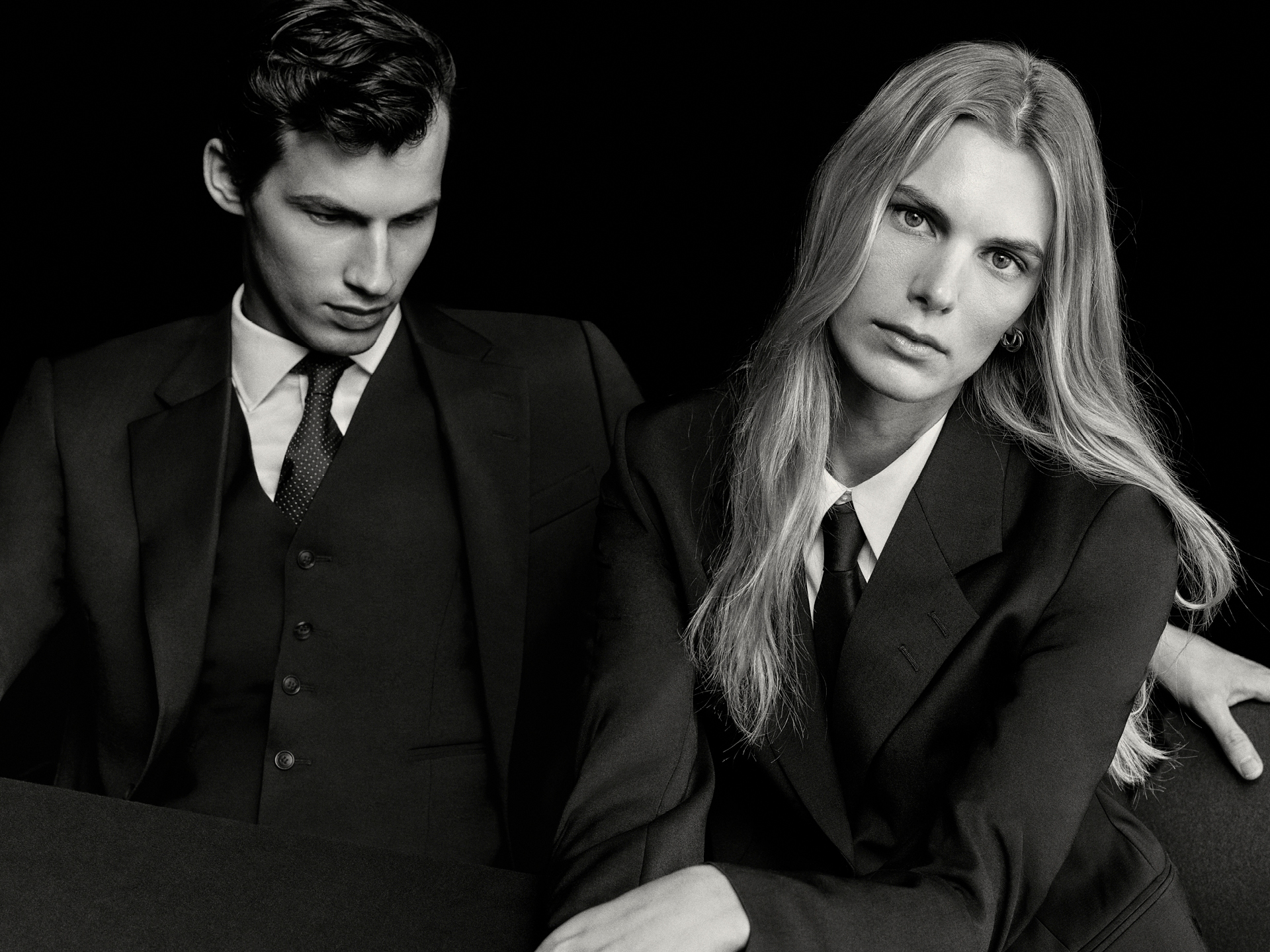 man and women in suits