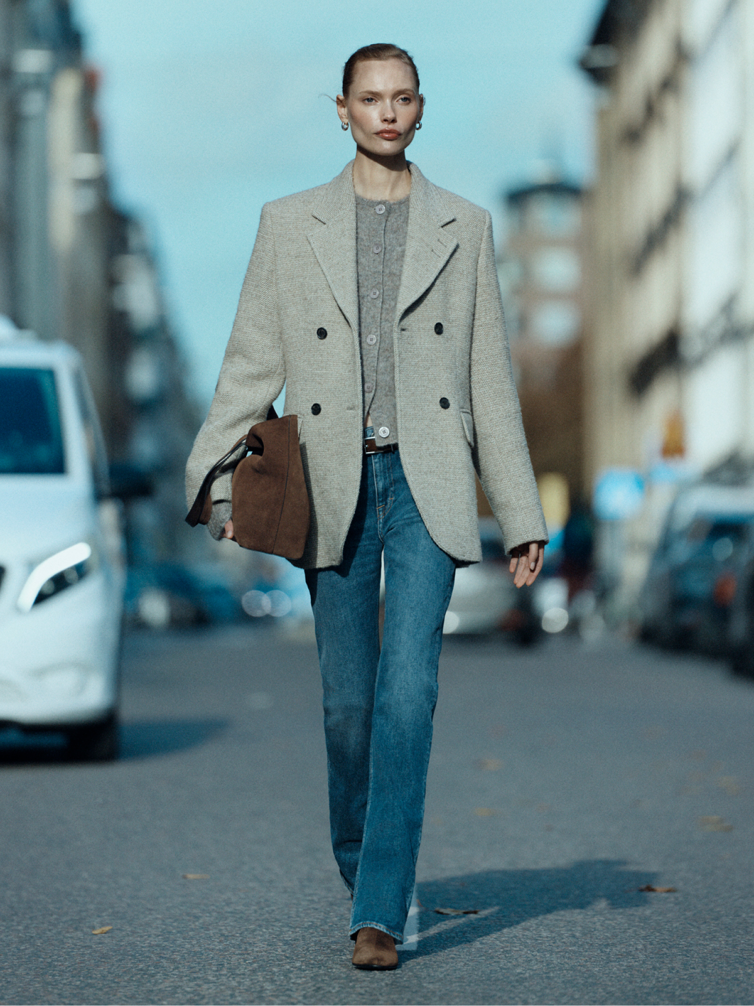 Woman in light beige blazer