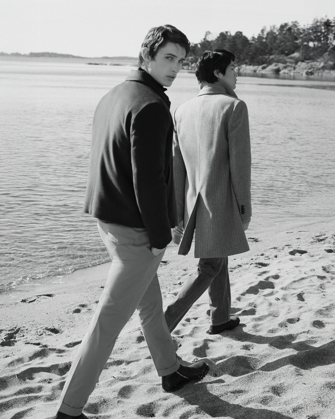 men walking on beach
