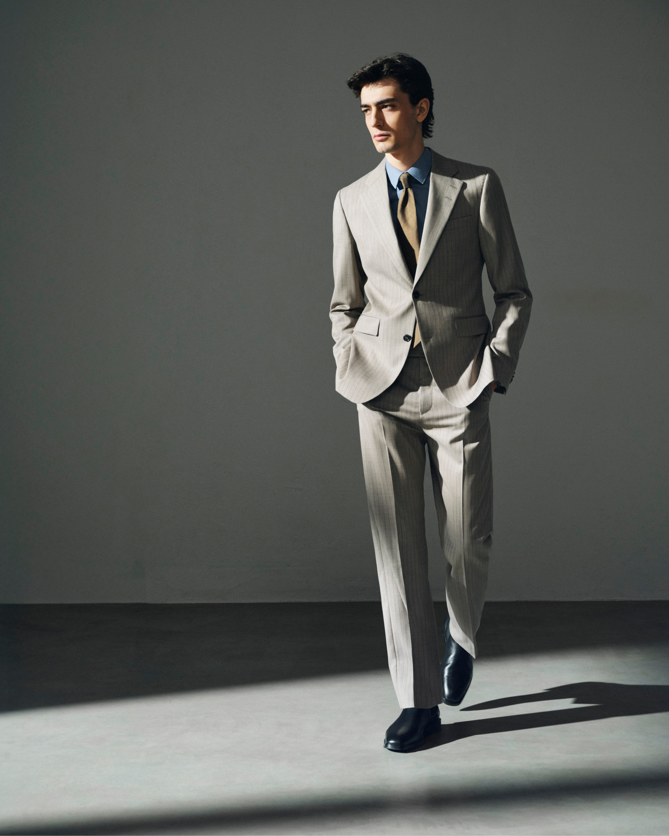 man in pinstripe suit