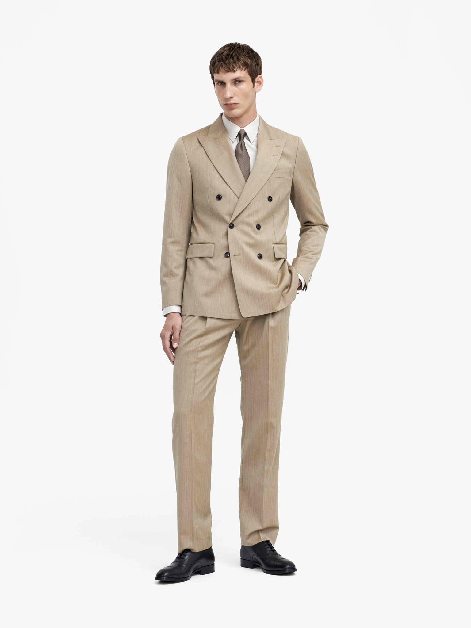 Man in beige suit