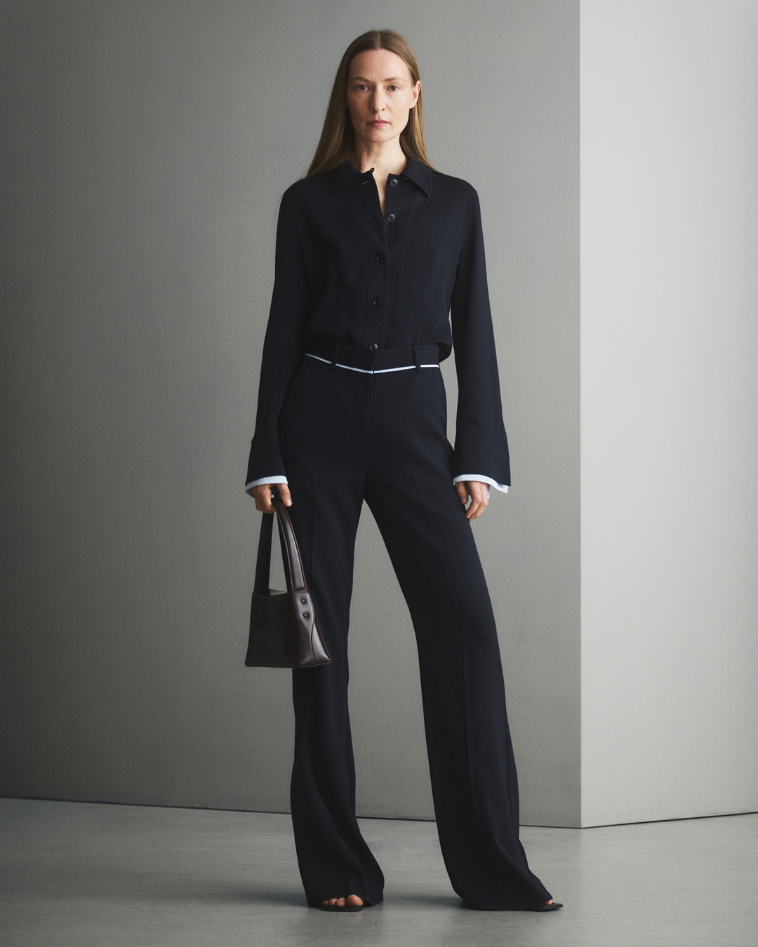 Woman in black outfit