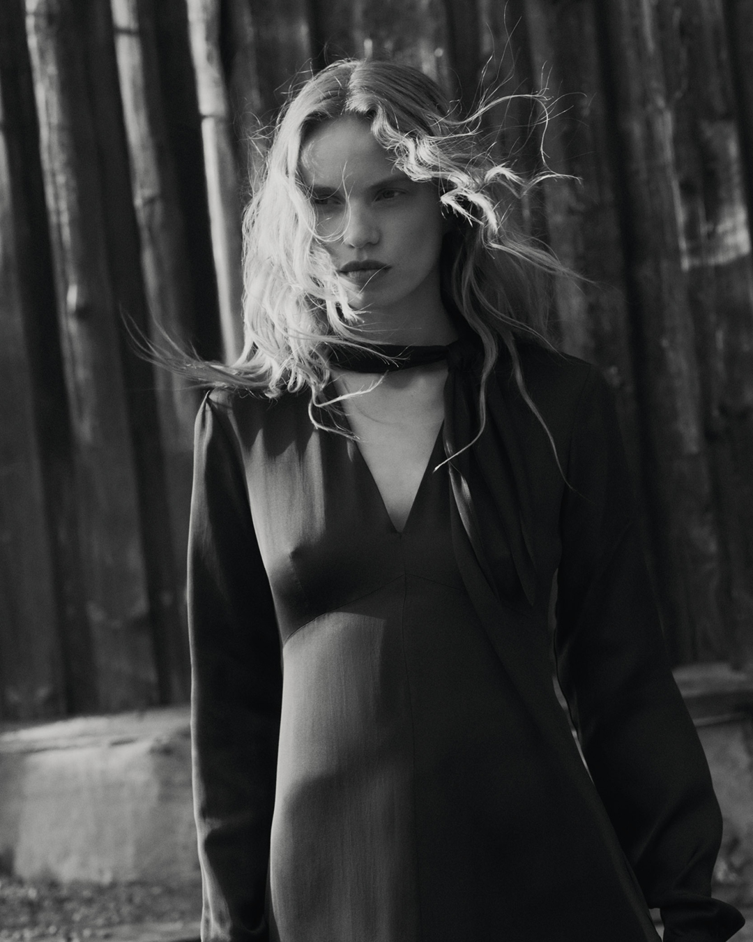 woman in dark satin dress
