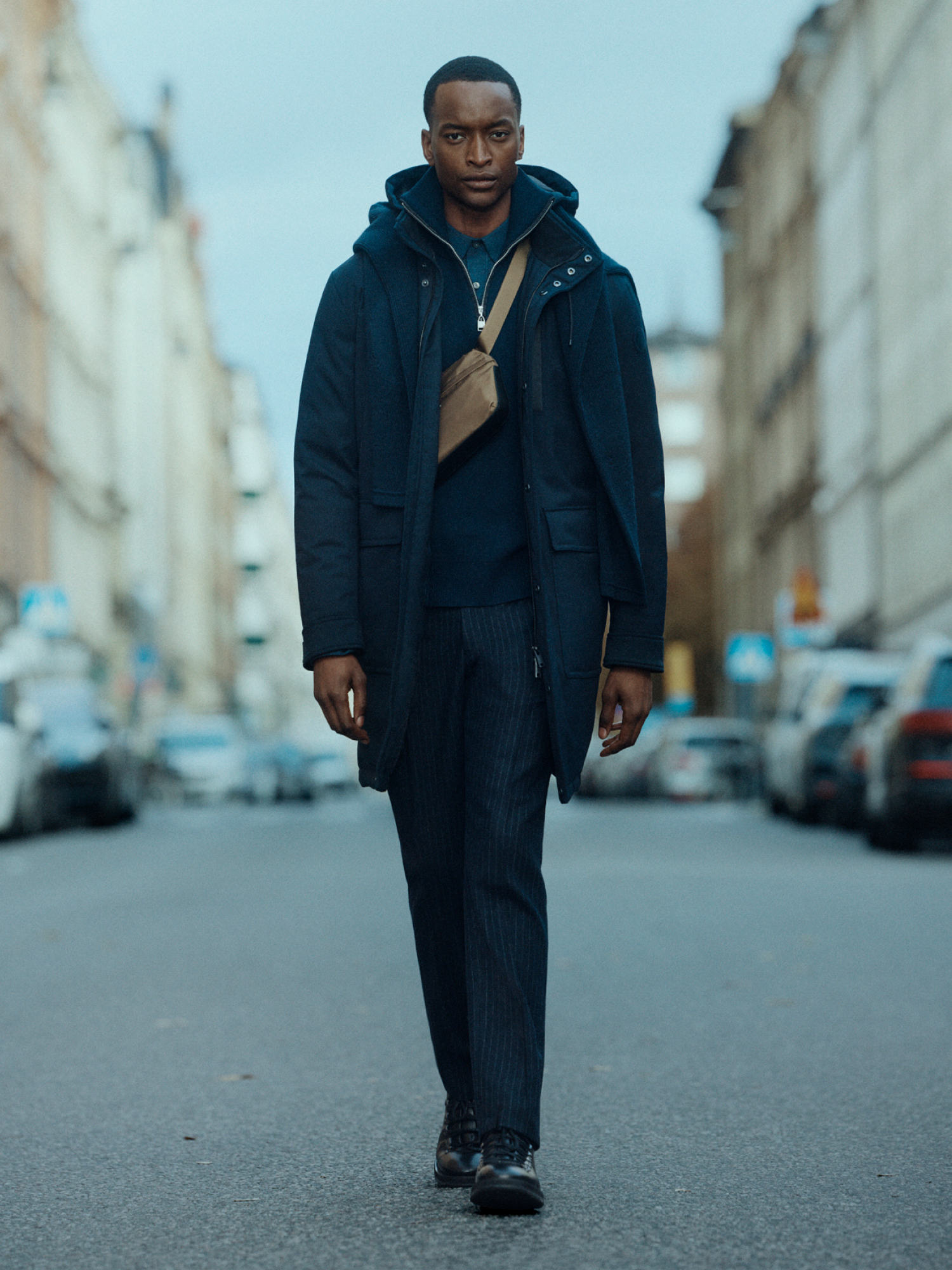 Man in longer puffer jacket