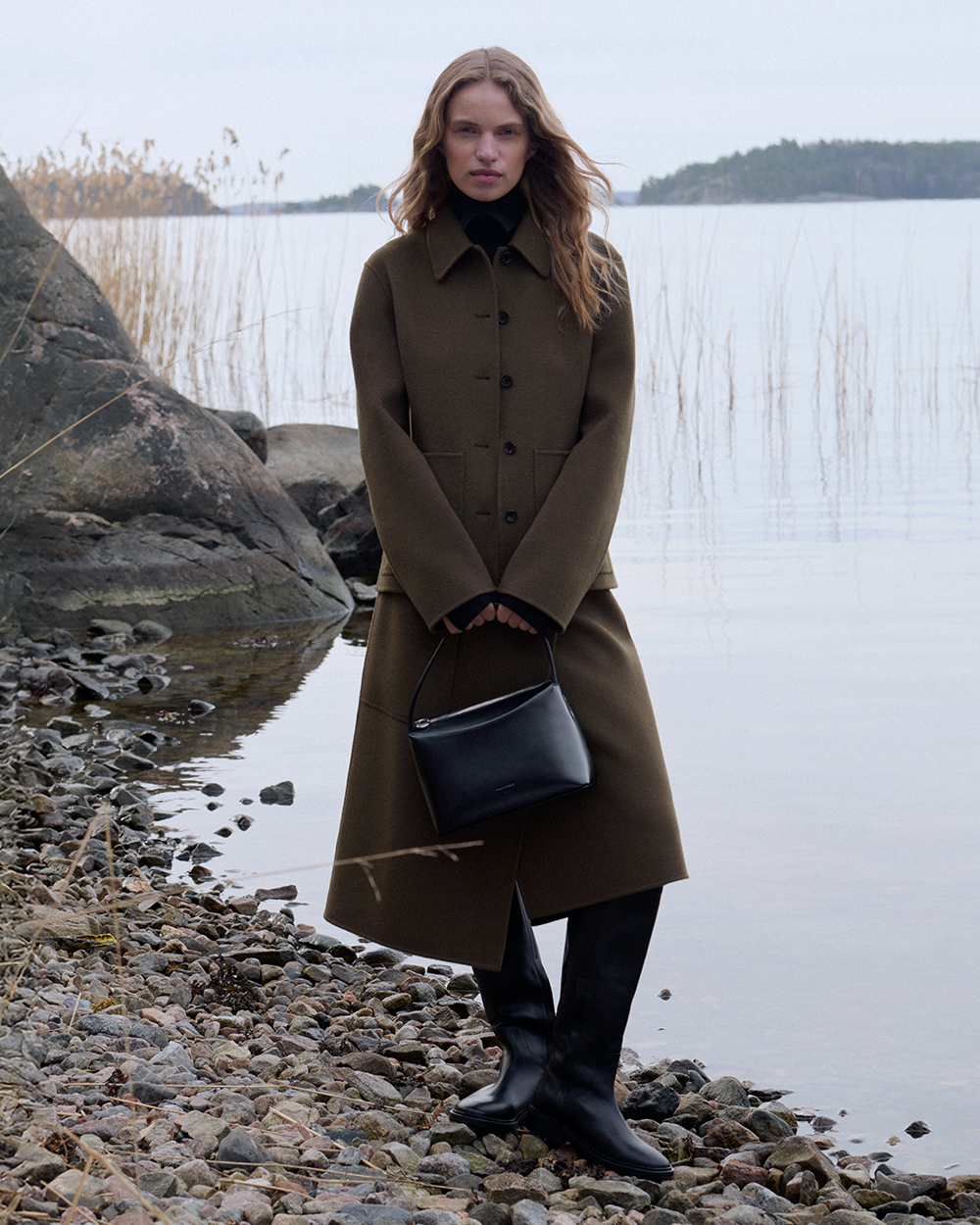 woman in green jacket