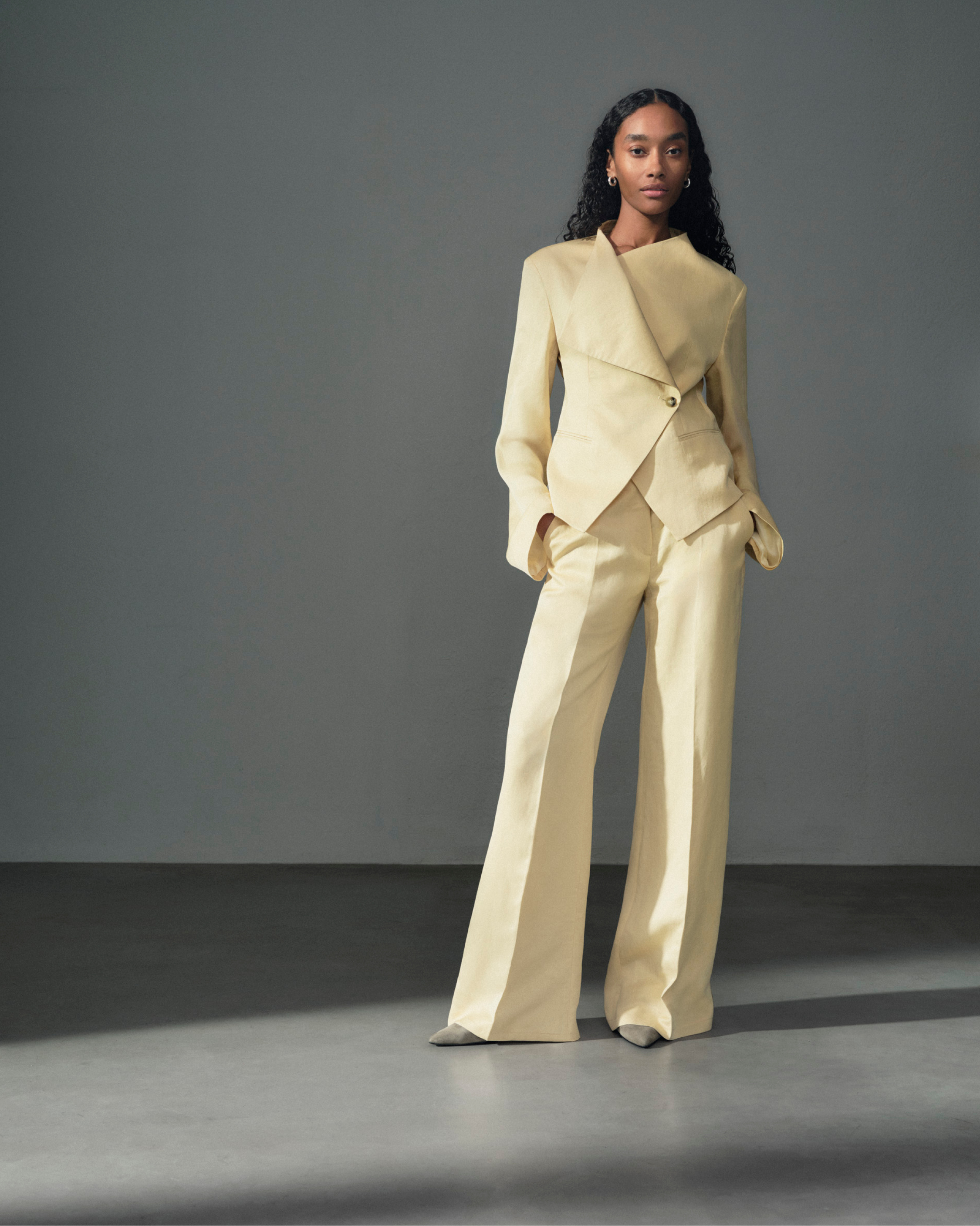 woman in yellow suit