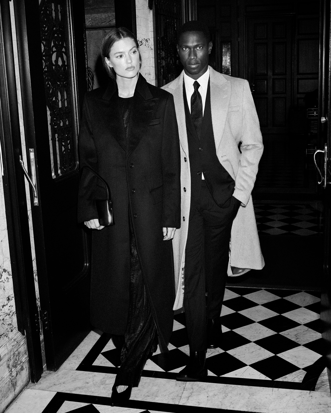 man and woman in festive wear