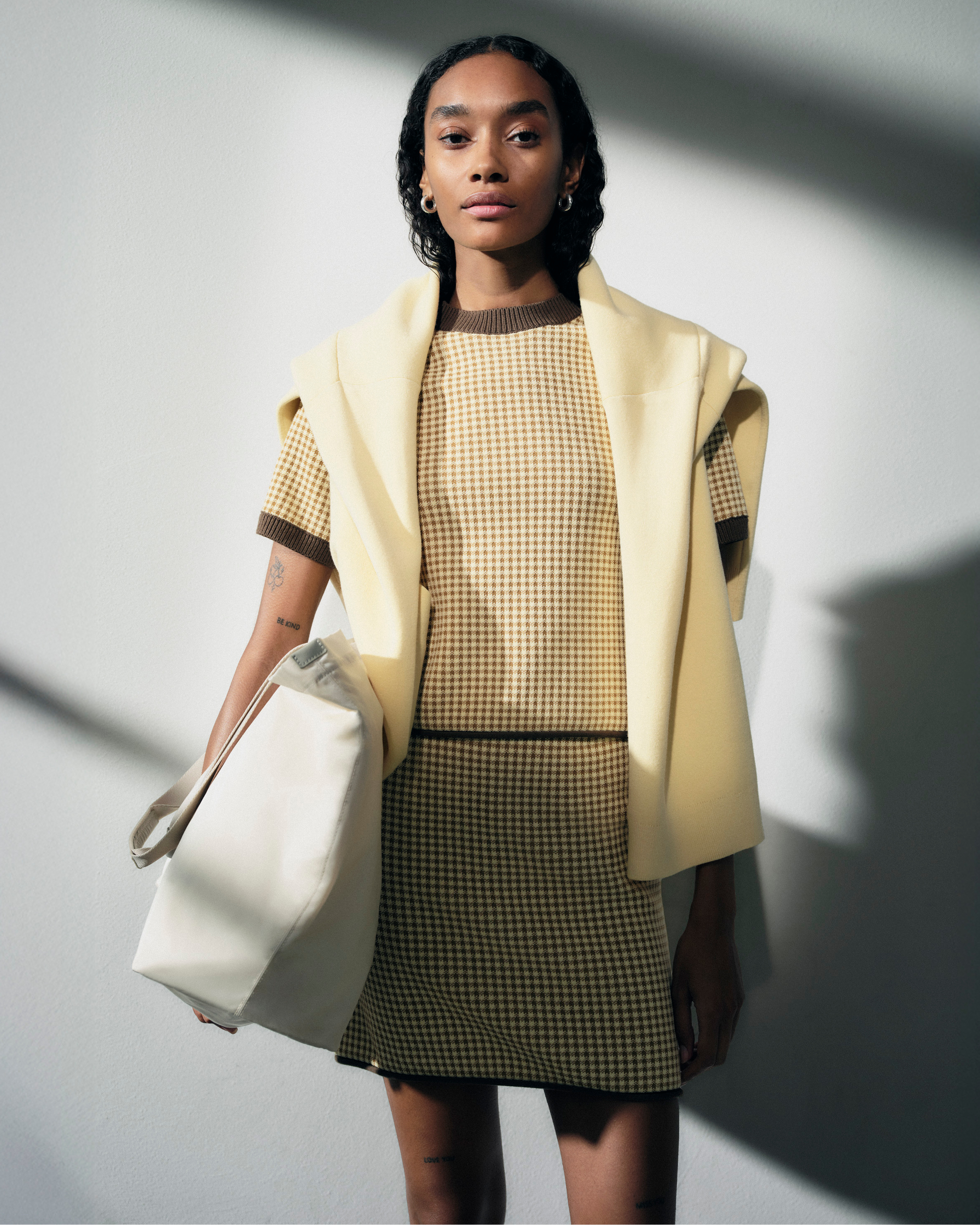 Woman in yellow checkered set