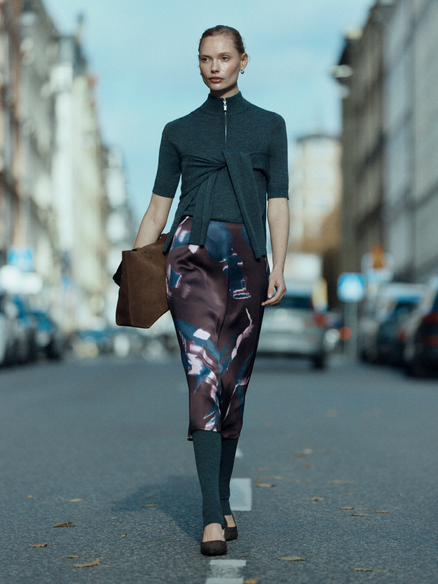 Woman in purple printed skirt