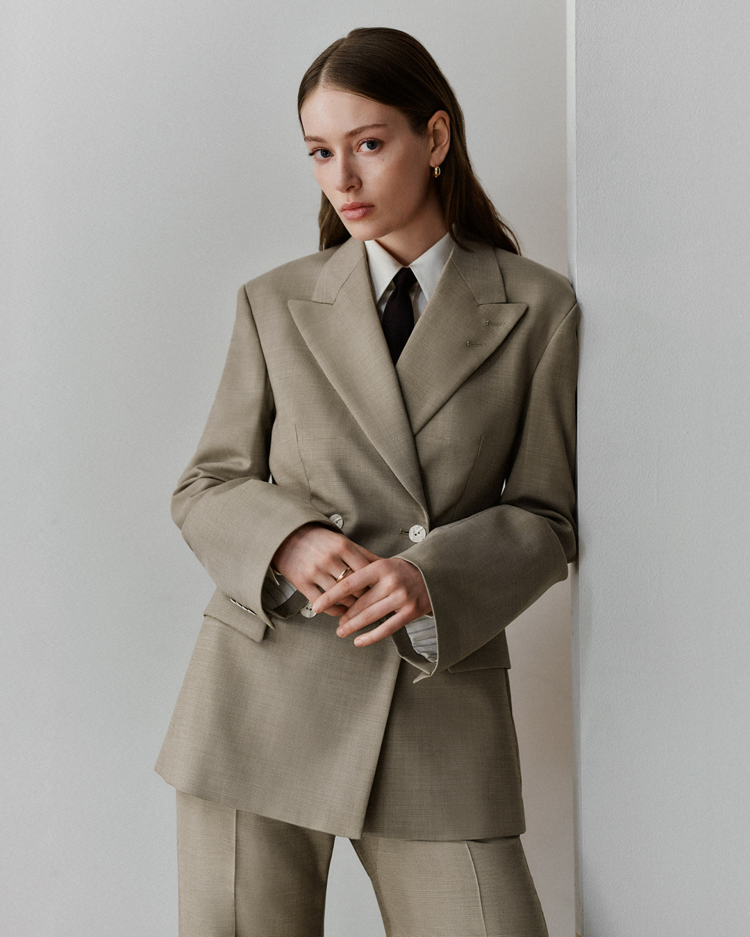 woman in beige blazer