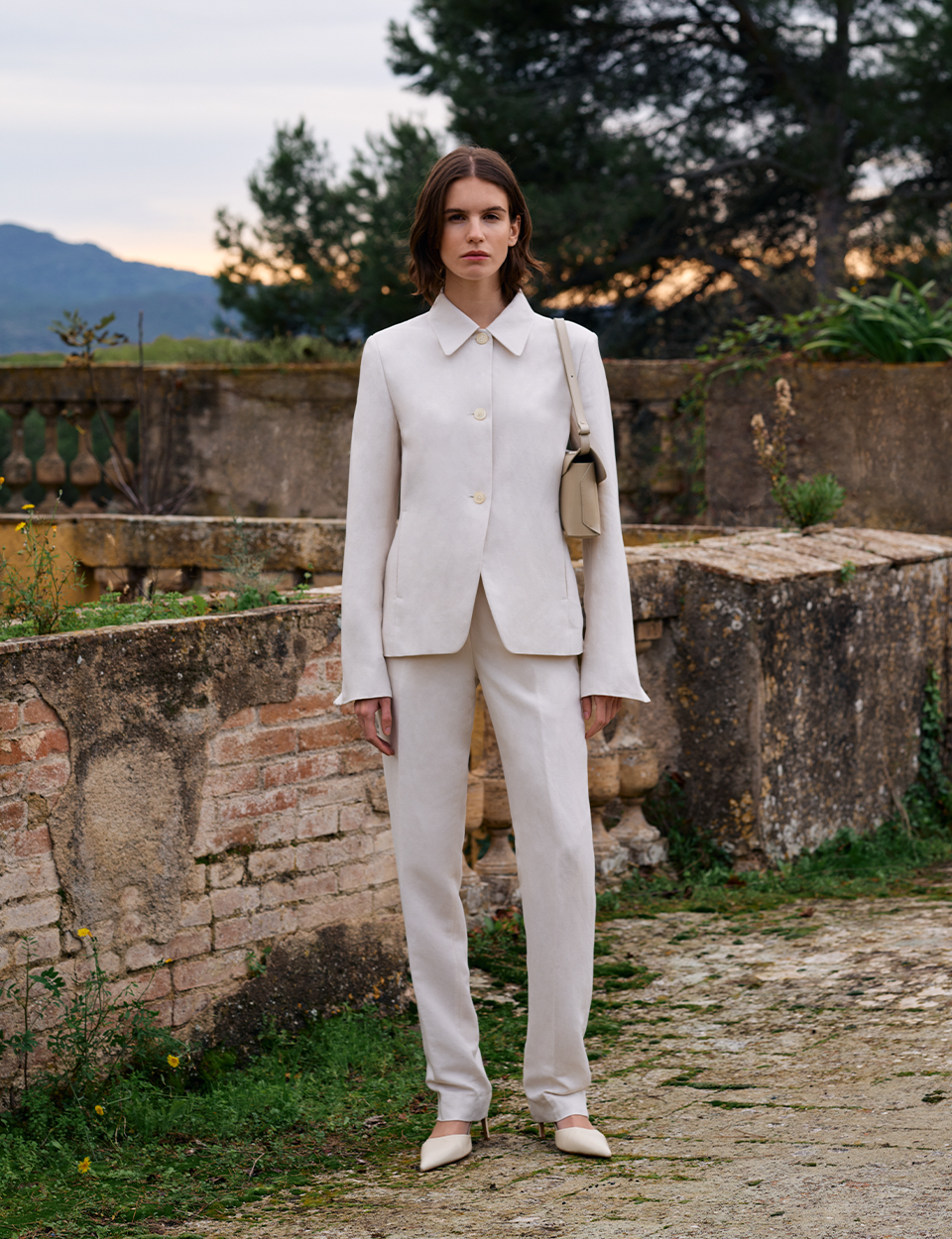 woman in beige suit