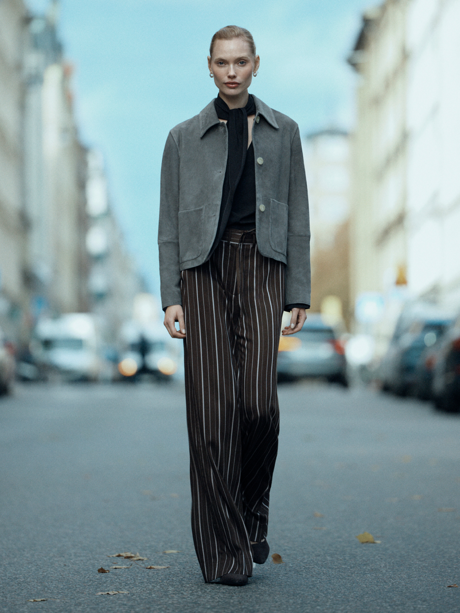 Woman in striped pants