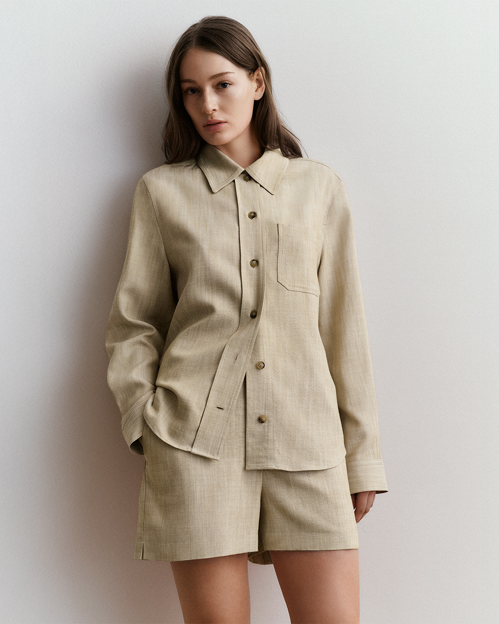 woman in beige short set
