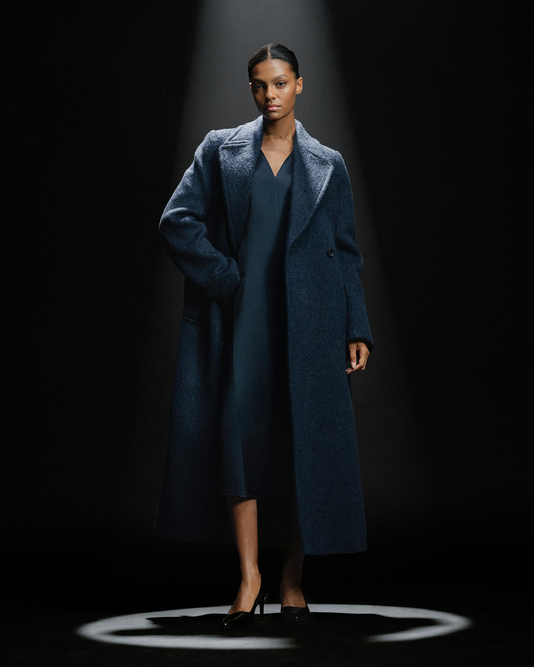 Long dark blue wool coat and satin dress