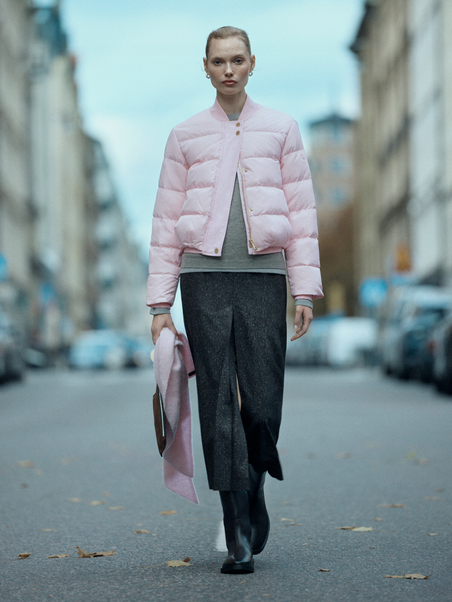 Woman in pink short puffer jacket