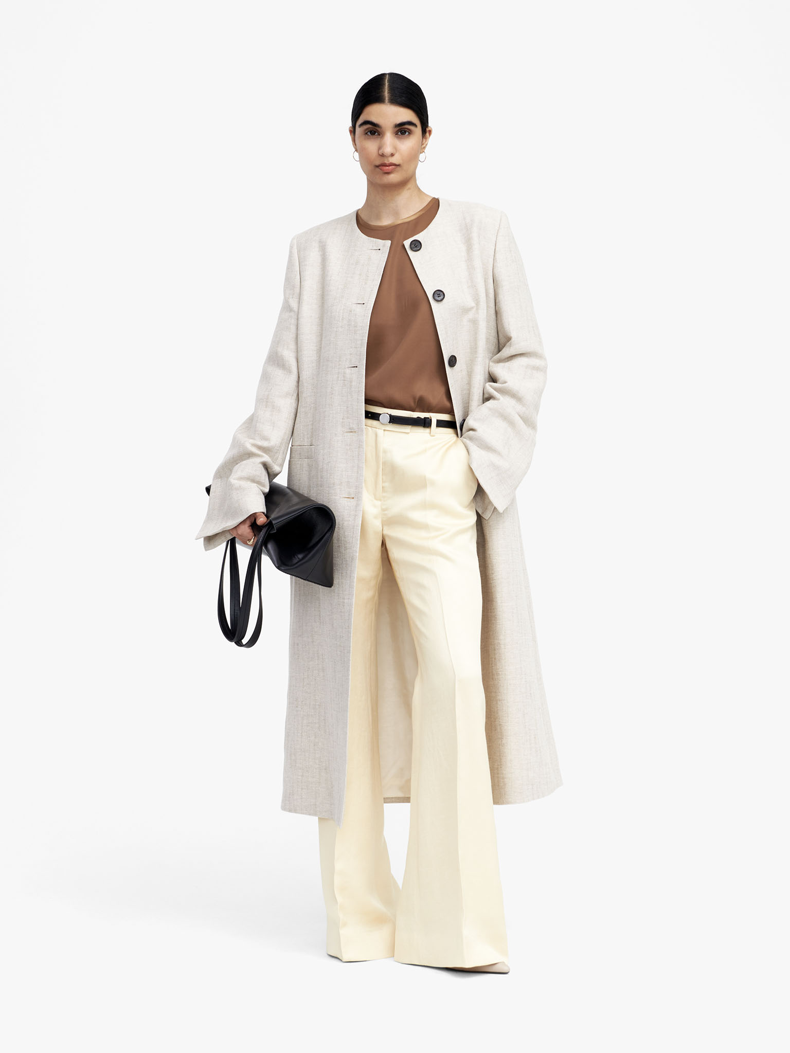 Woman in beige coat