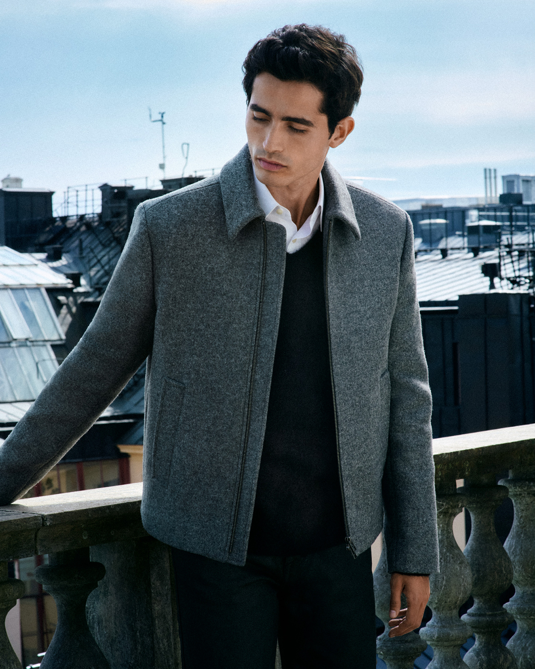 Men in grey bomber jacket