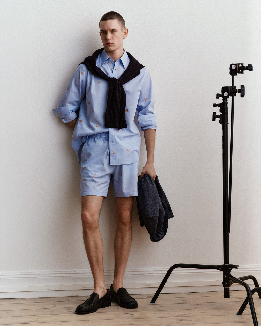 man in blue short set