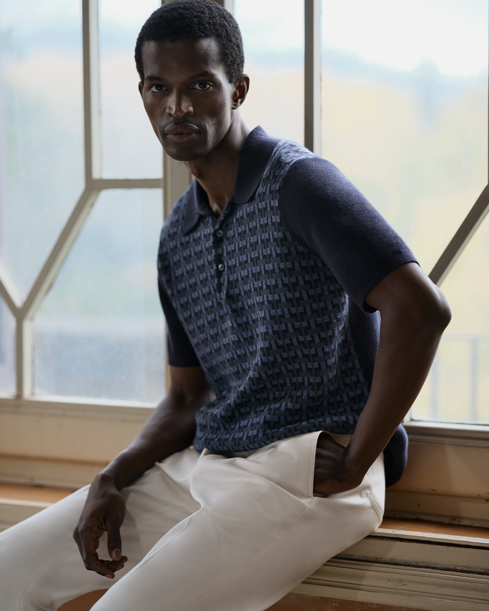 Man in printed polo shirt