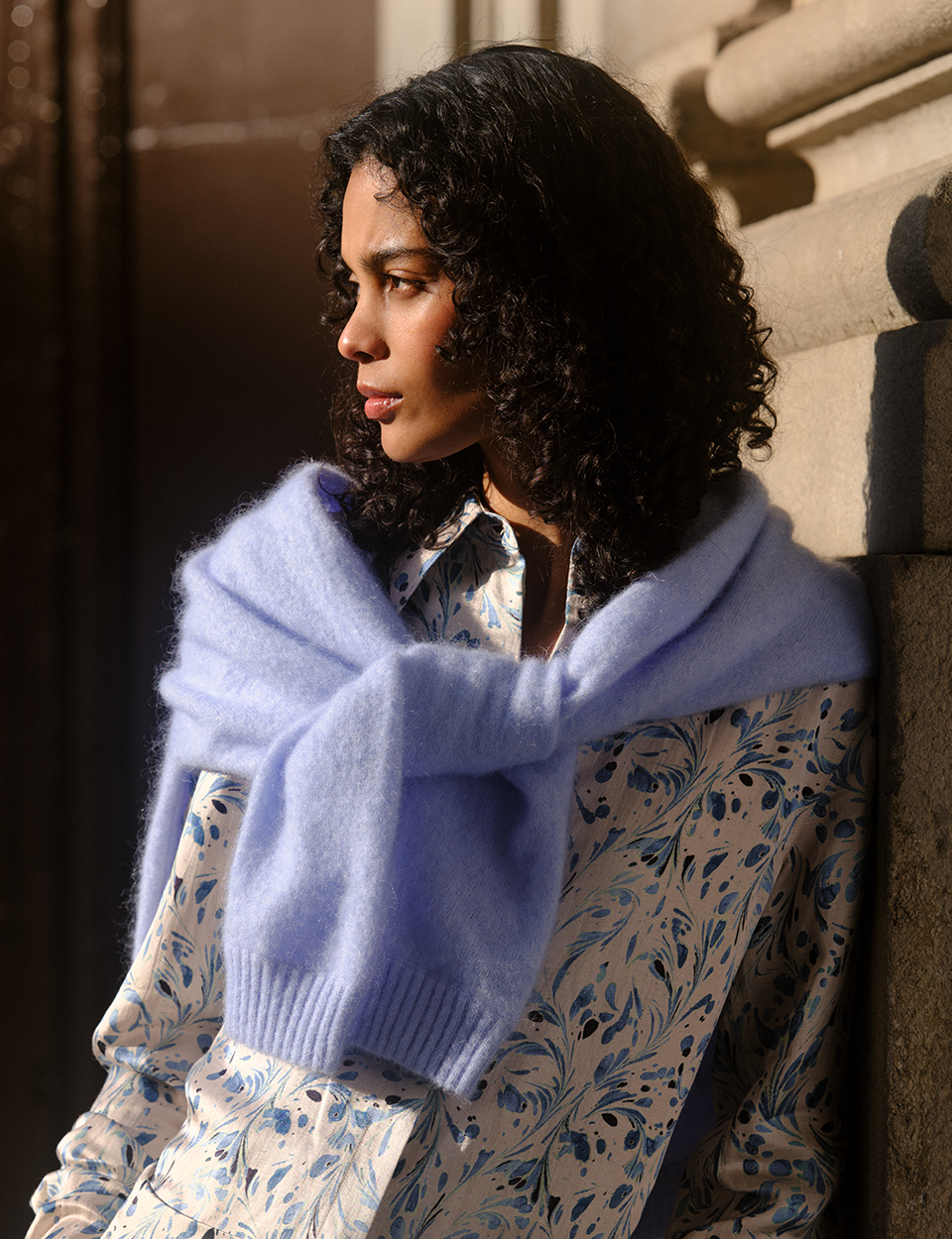 woman in blue knit