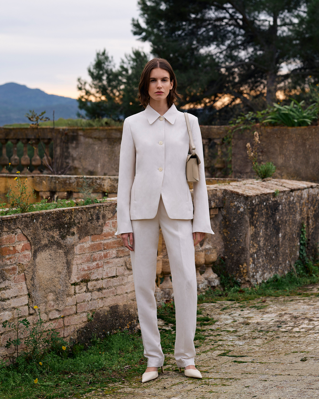 Woman in beige suit 