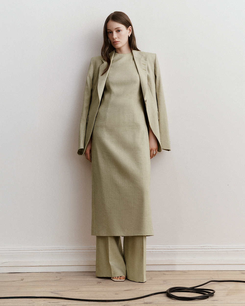 woman in green linen dress