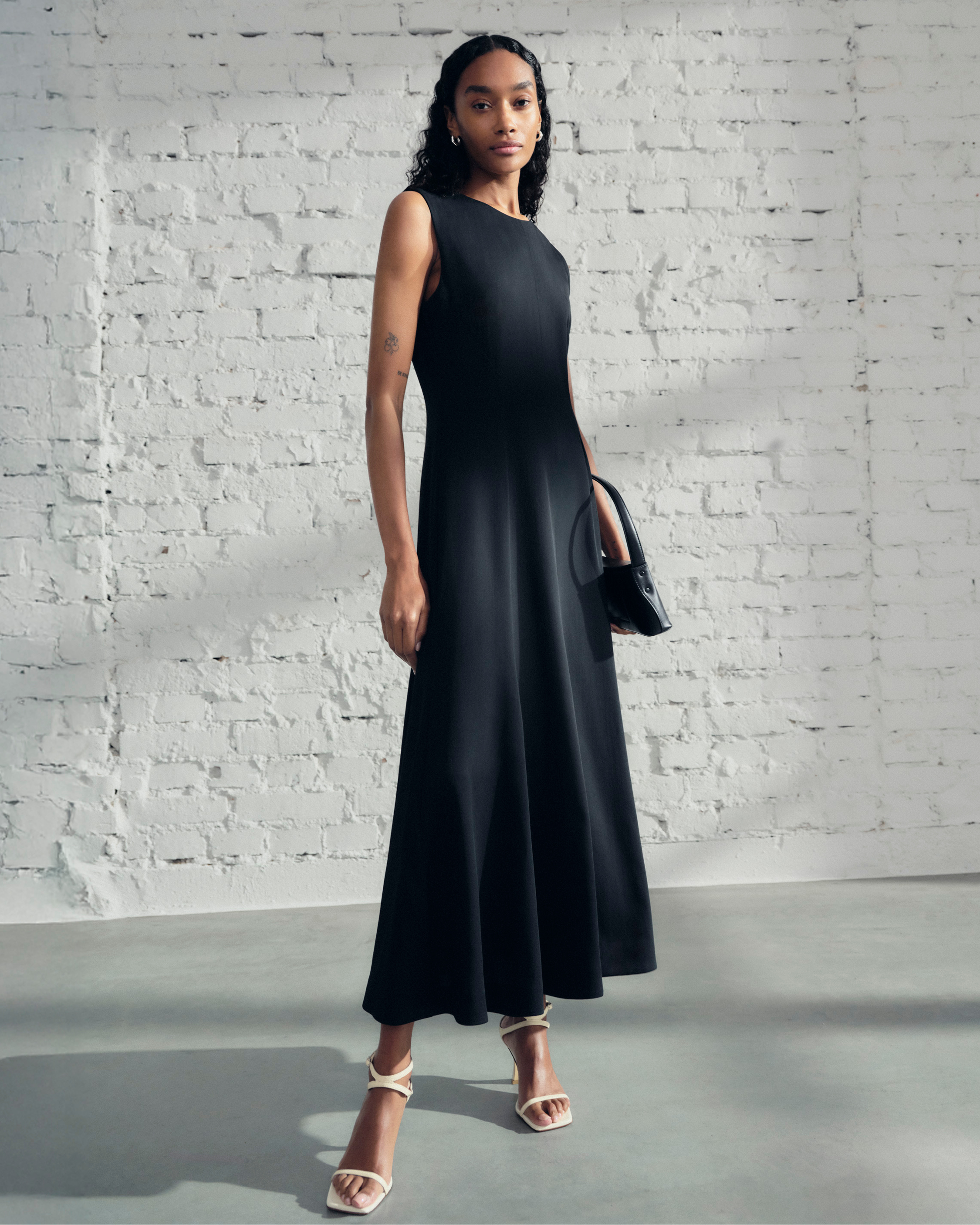 woman in long black dress