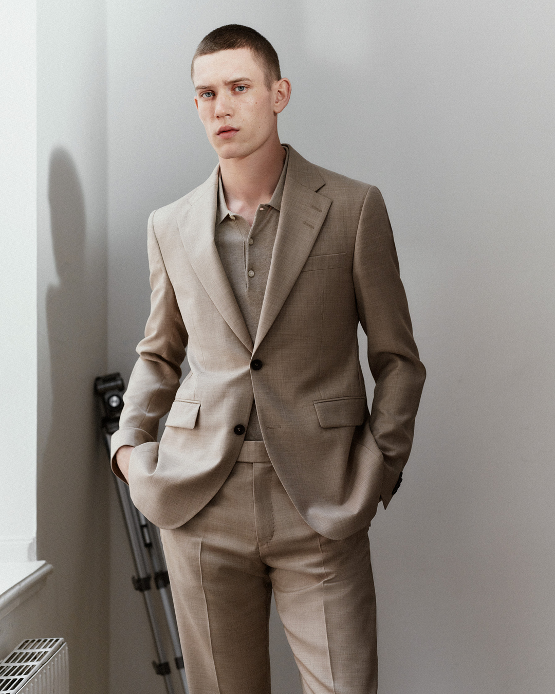 man inn beige suit