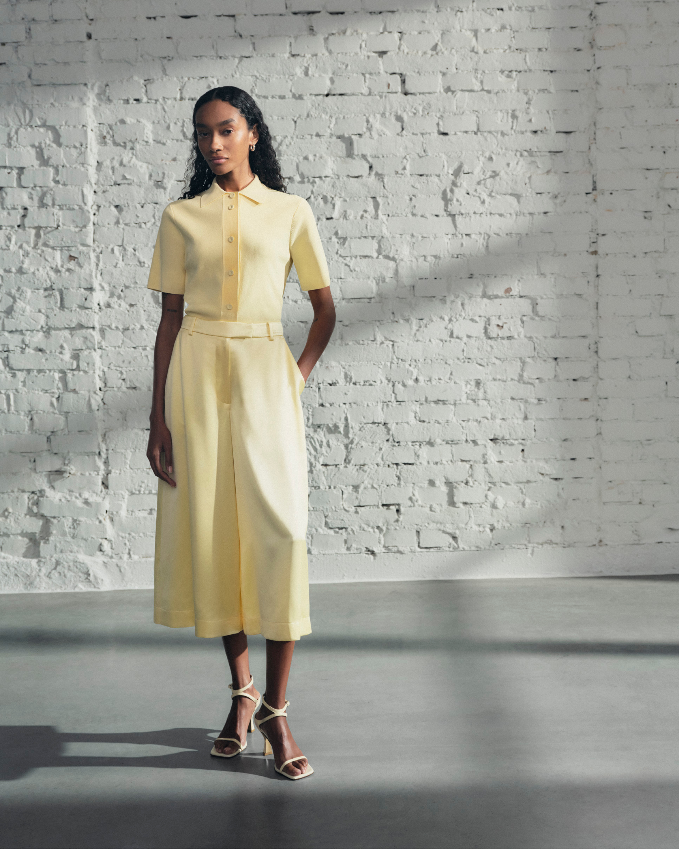 Woman in butter yellow outfit