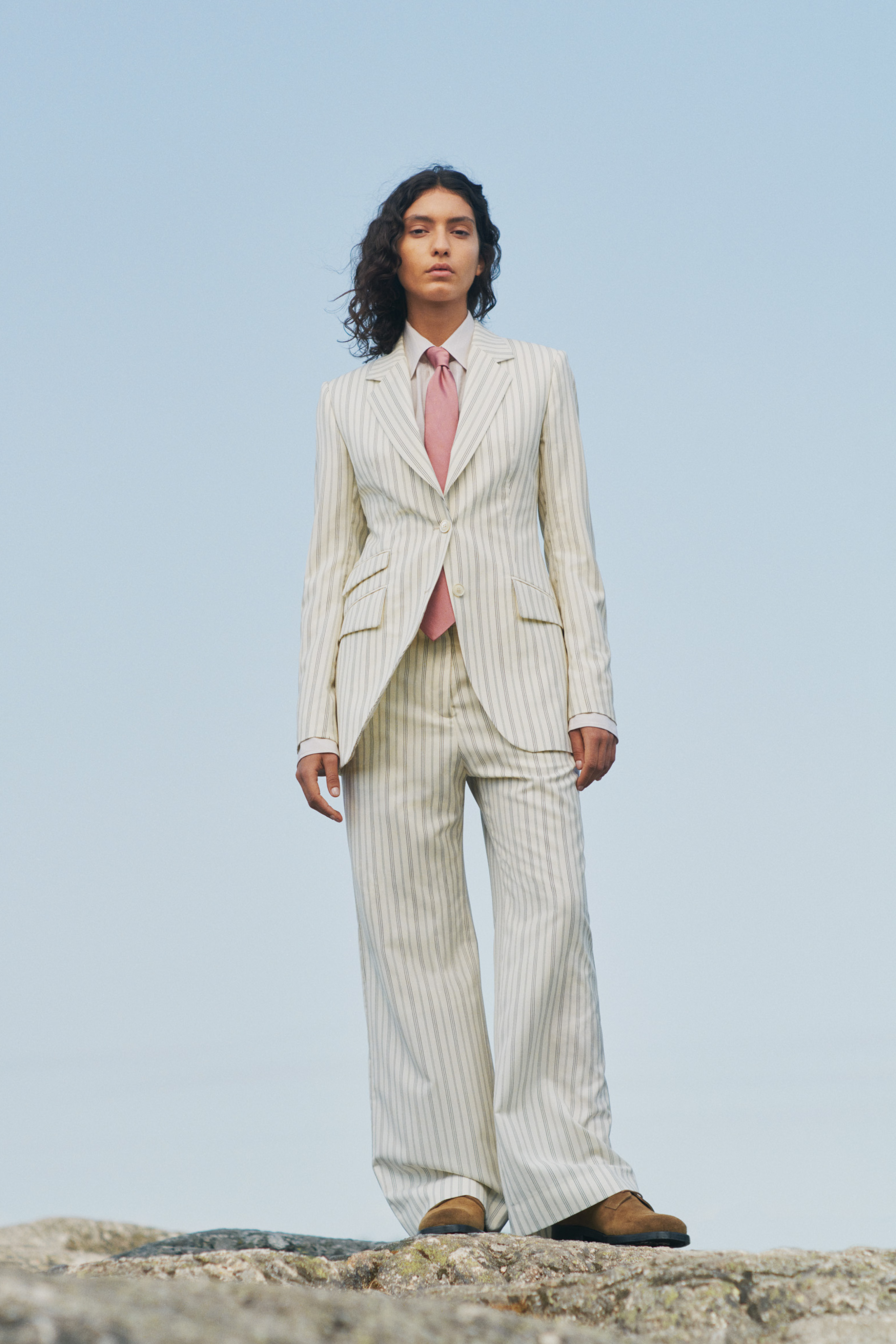 Model wearing a stripe suit from Tiger of Sweden