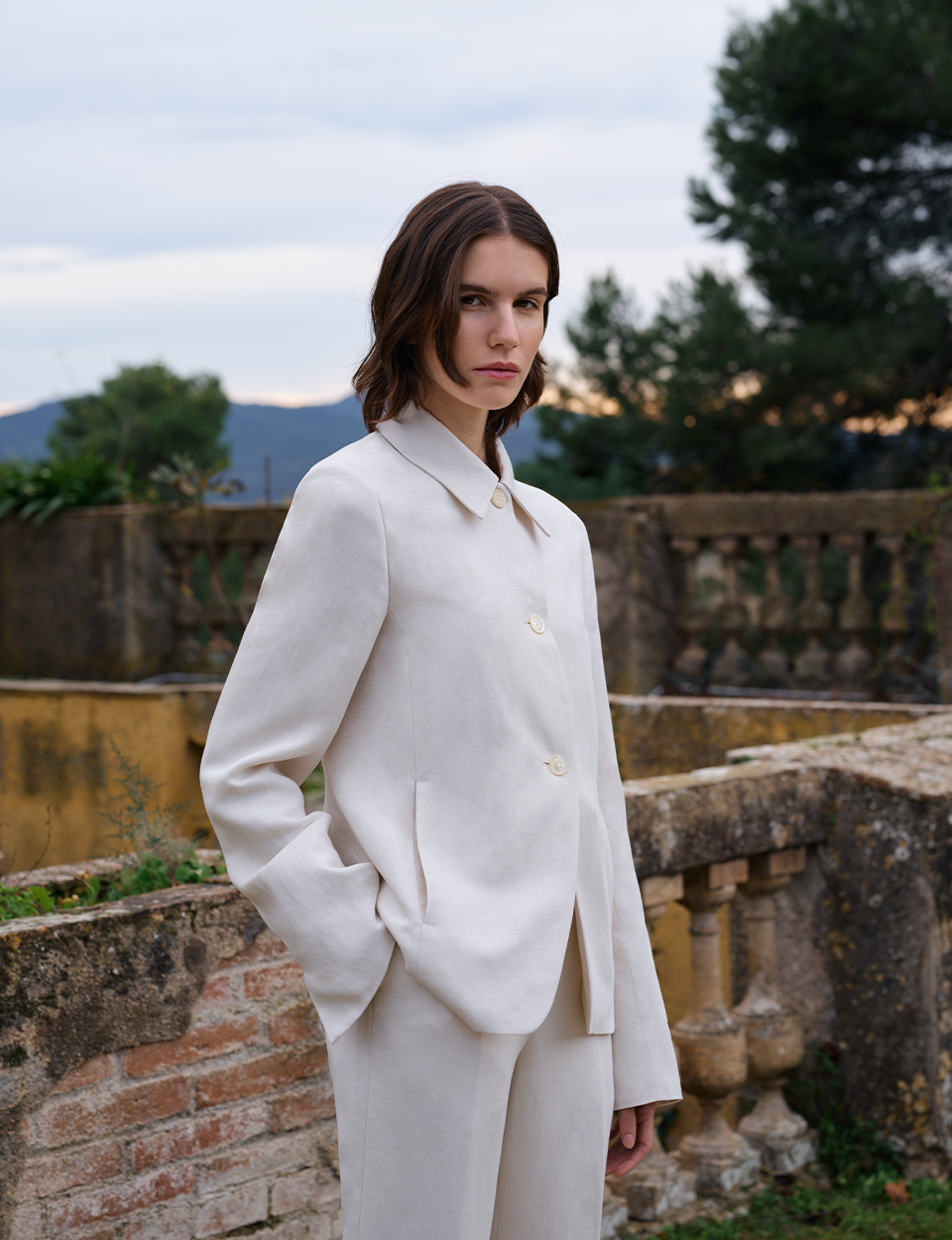 woman in beige suit
