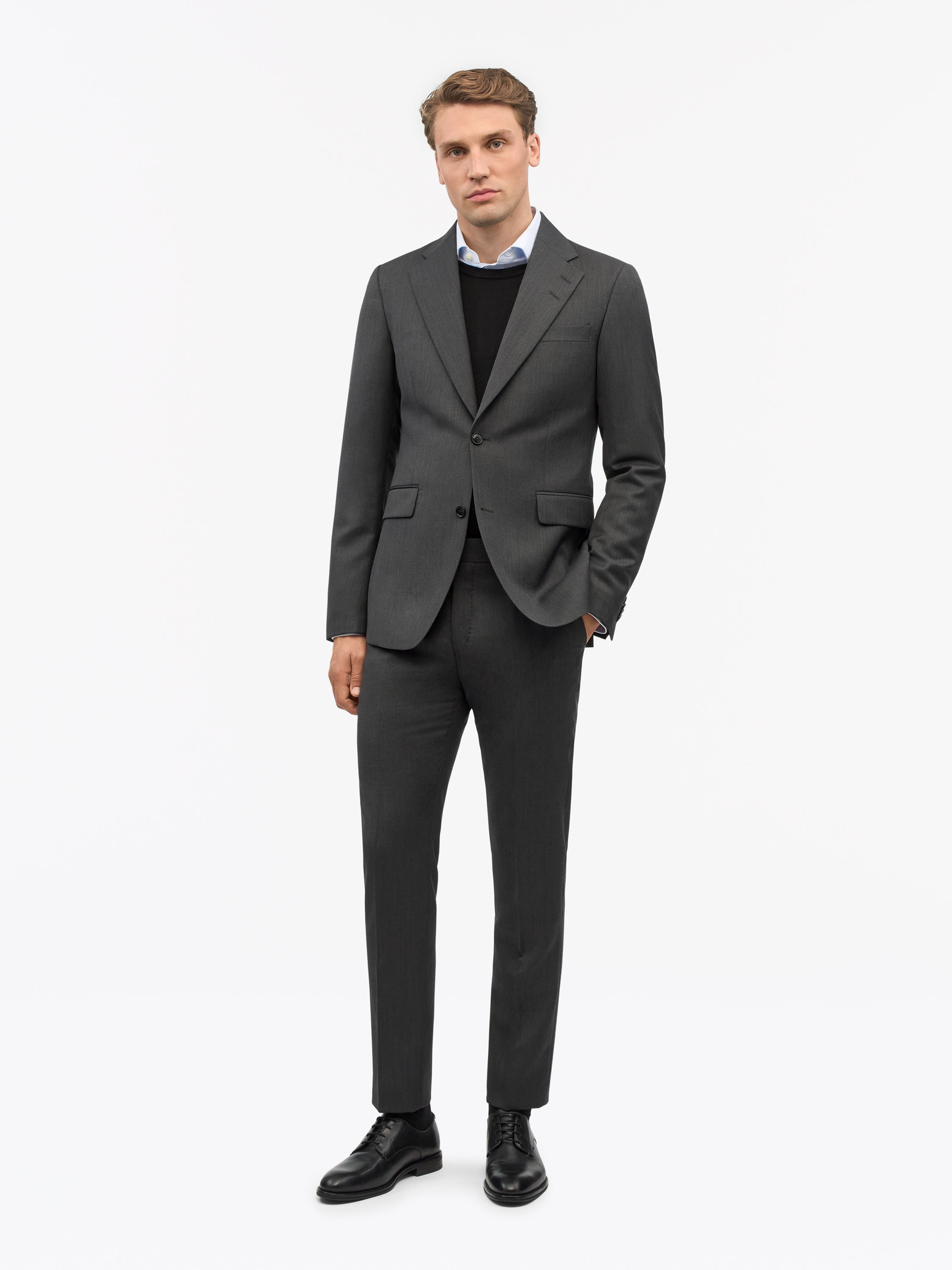 Man in dark green Ease suit