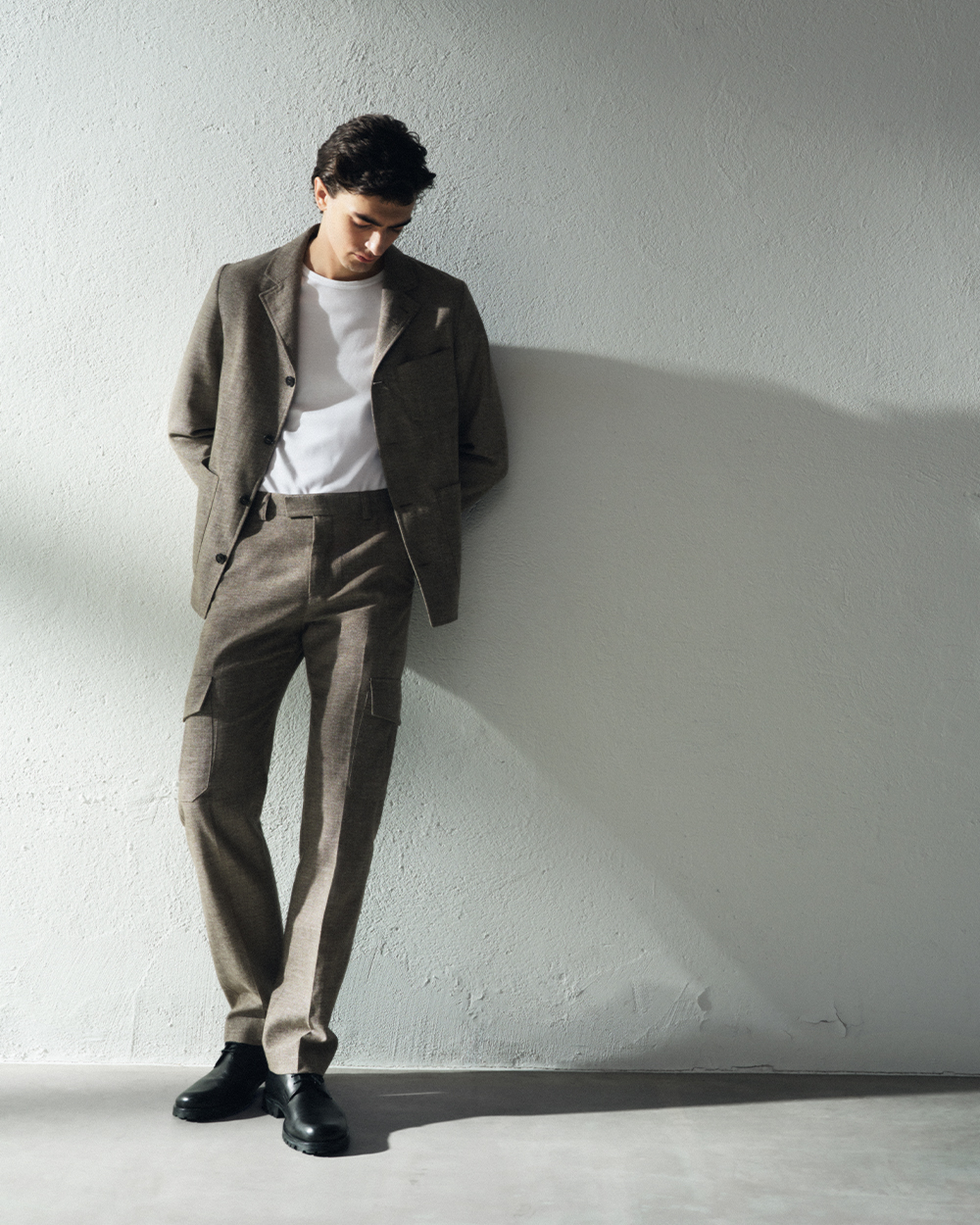 man in chinos and overshirt