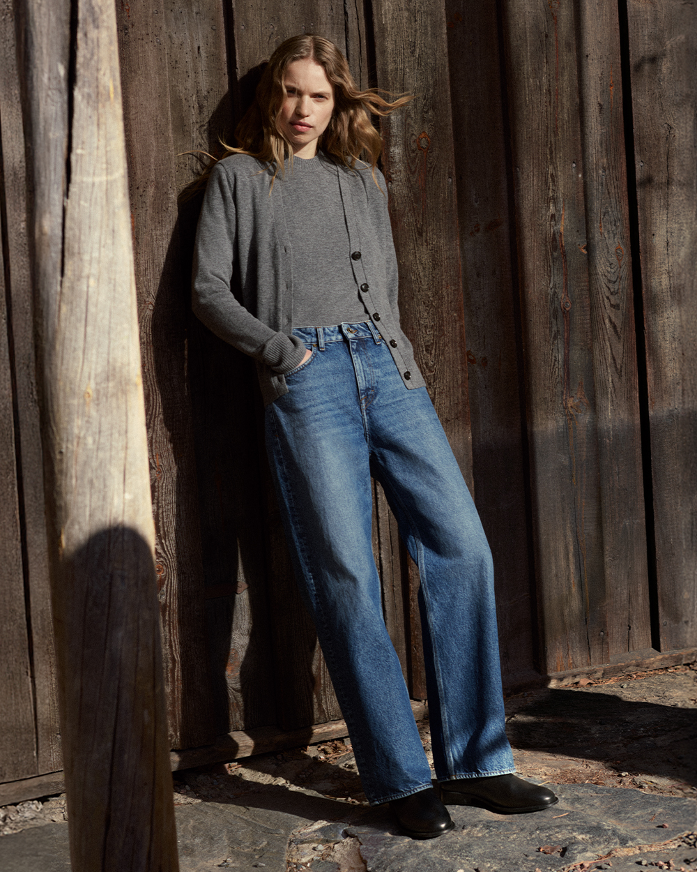 woman in jeans and knitwear