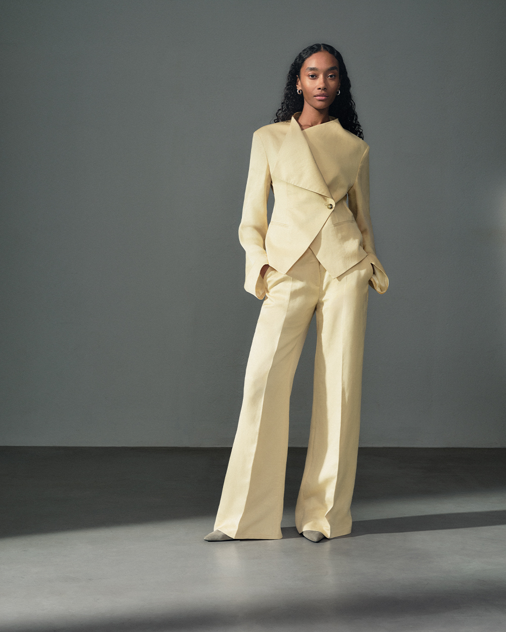 Woman in yellow suit