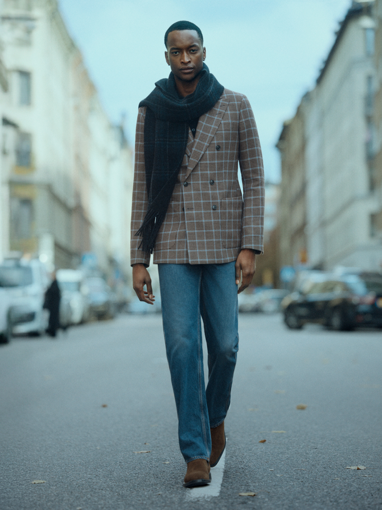 Man in checkered blazer